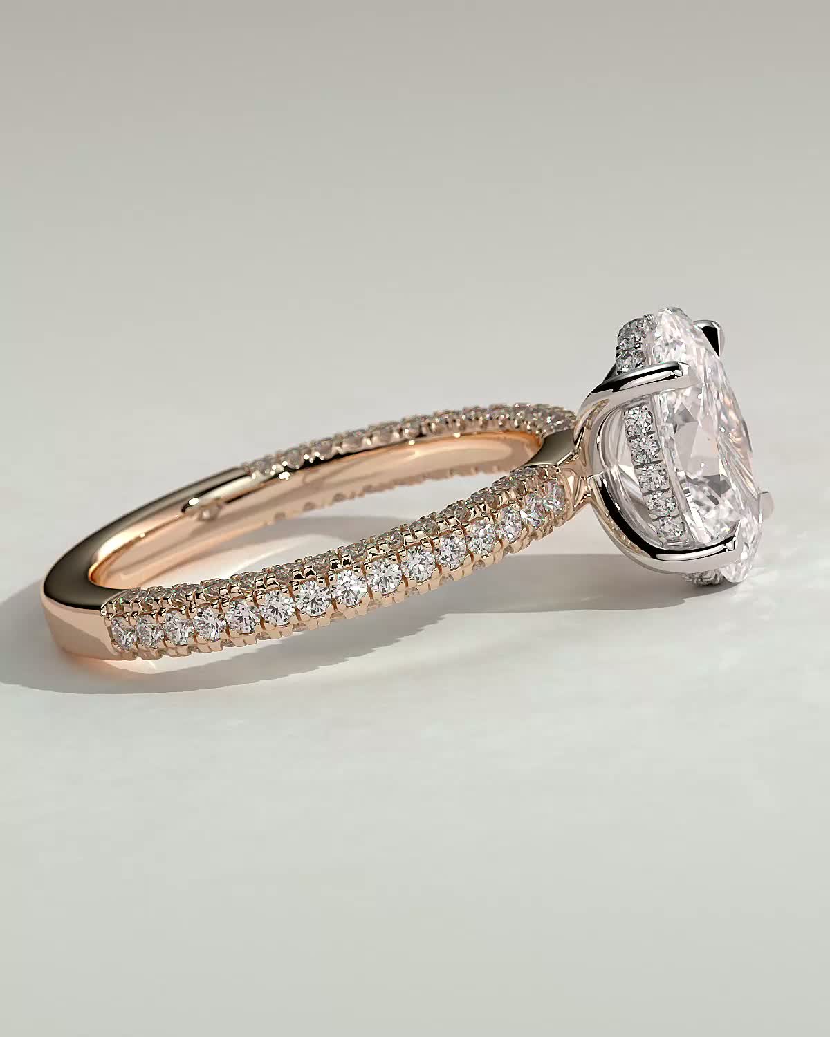Penelope   Oval Solitaire with Hidden Halo and Triple Pav - 18k Rose Gold / 18k White Gold