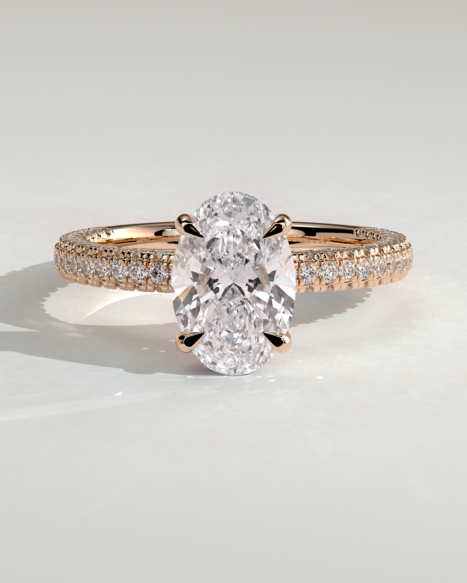 Penelope   Oval Solitaire with Hidden Halo and Triple Pav - 18k Rose Gold