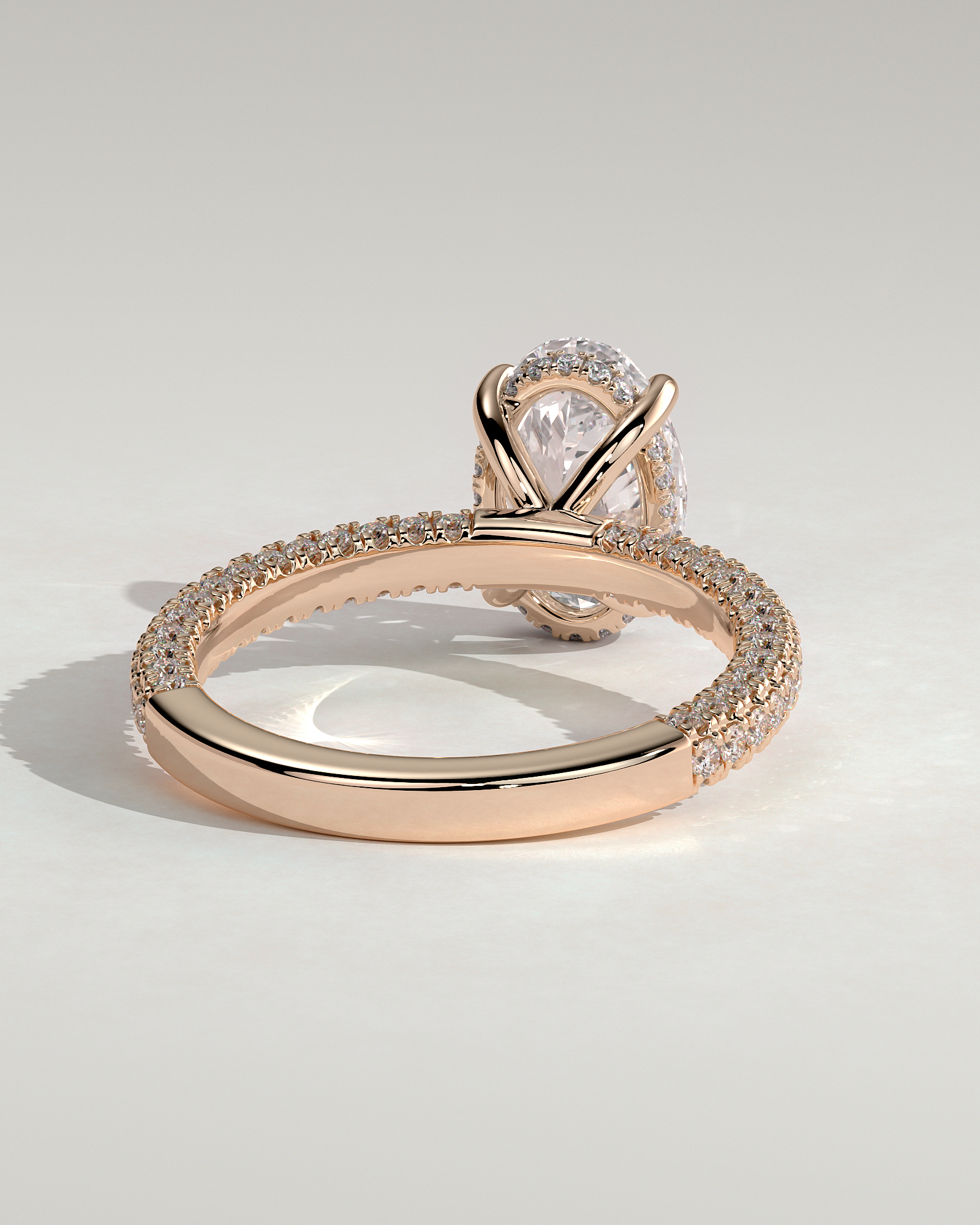 Penelope   Oval Solitaire with Hidden Halo and Triple Pav - 18k Rose Gold