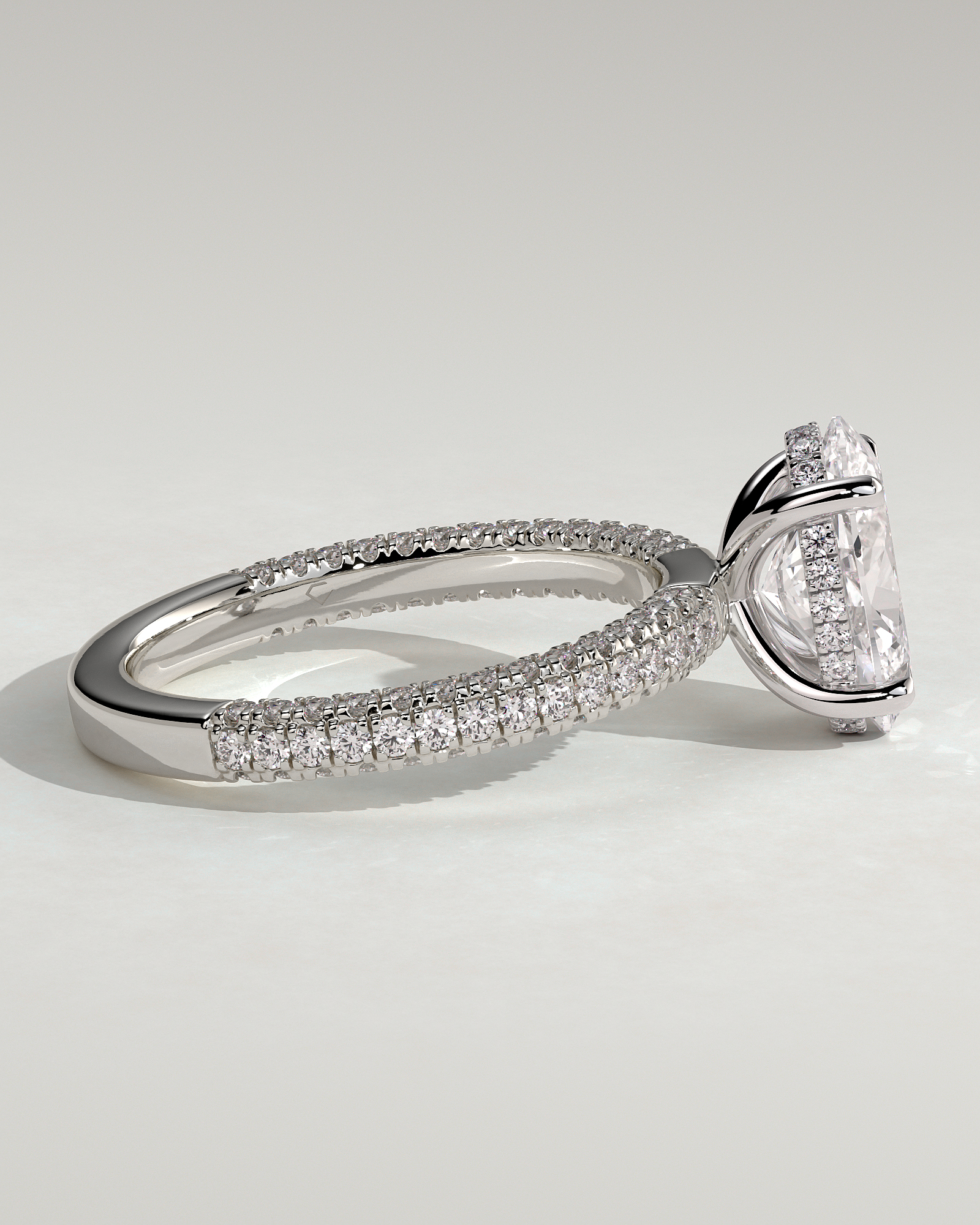 Penelope   Oval Solitaire with Hidden Halo and Triple Pav - 18k White Gold