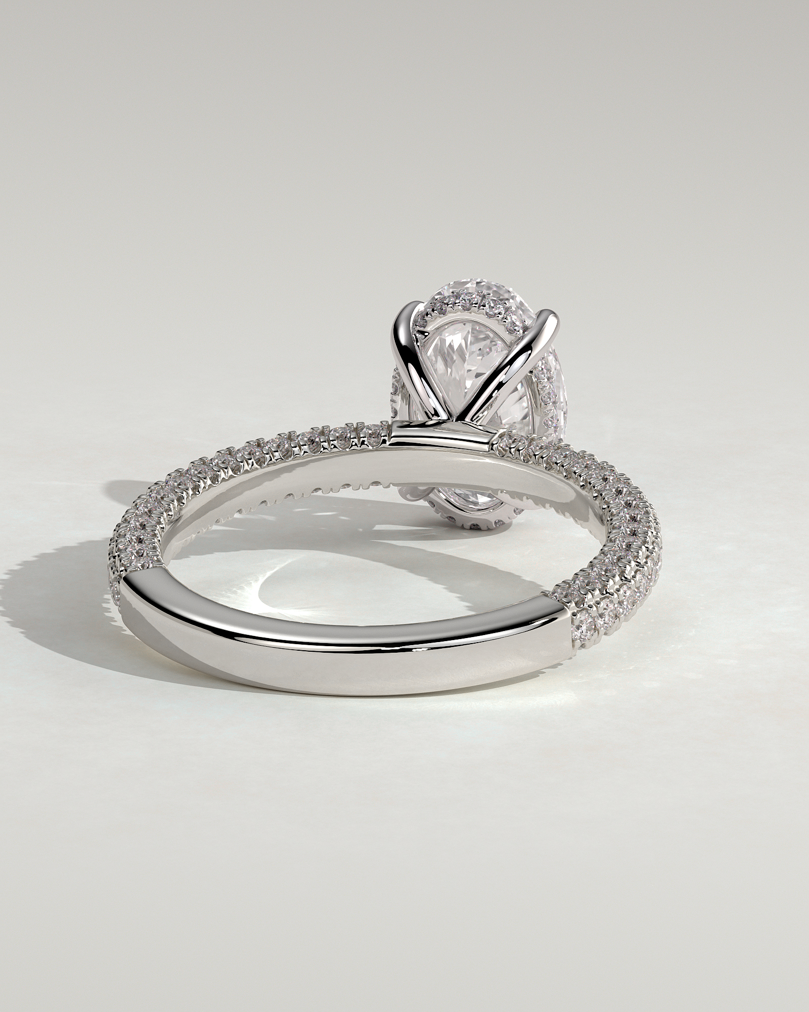 Penelope   Oval Solitaire with Hidden Halo and Triple Pav - 18k White Gold