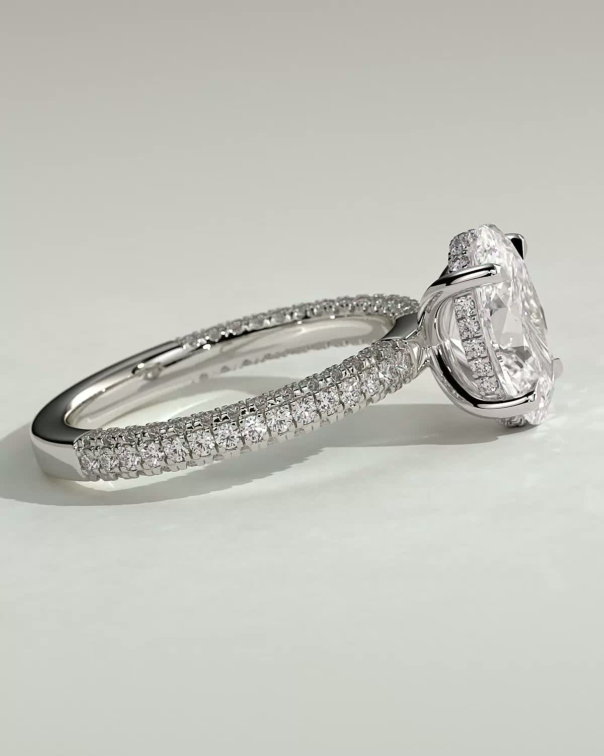 Penelope   Oval Solitaire with Hidden Halo and Triple Pav - 18k White Gold