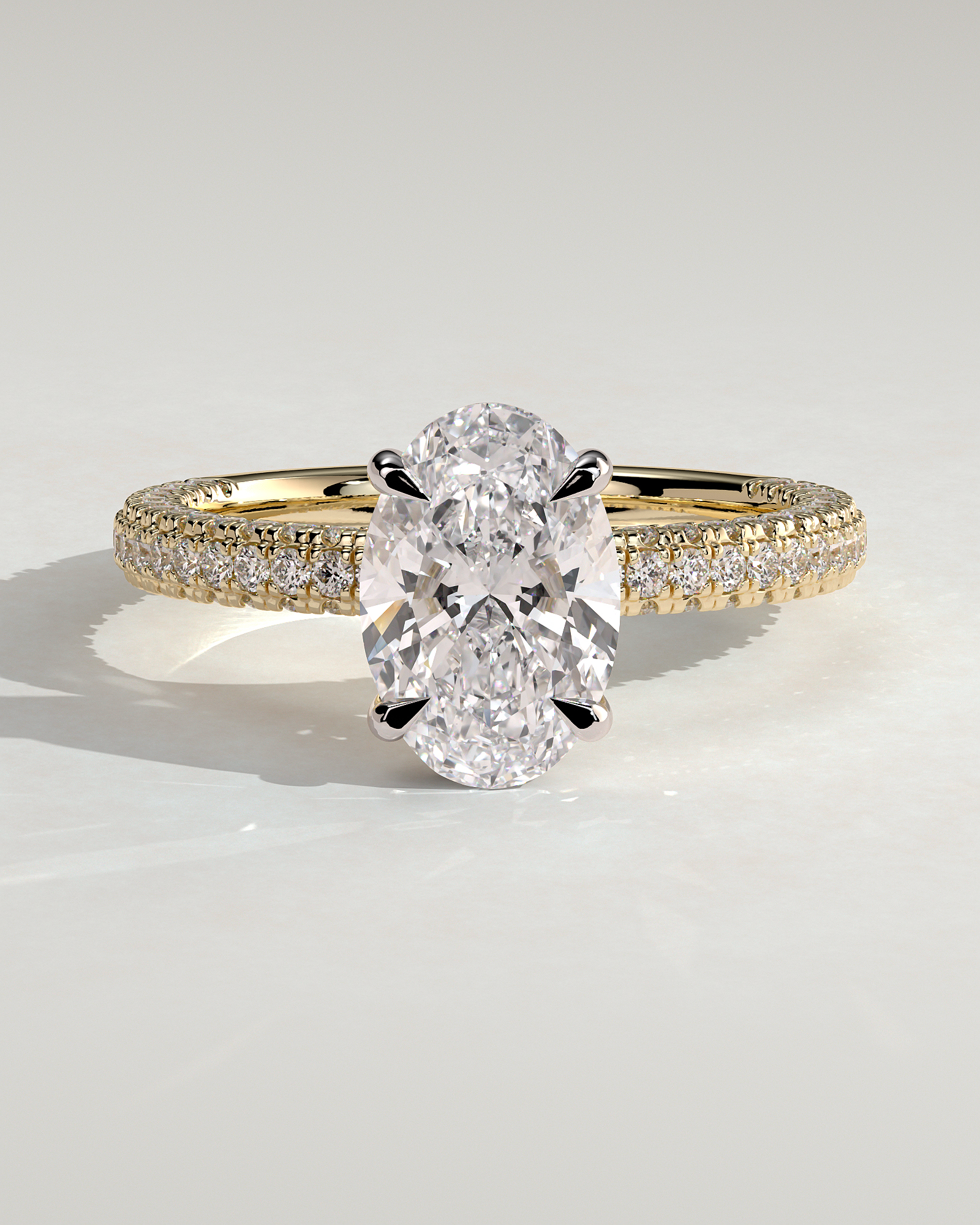 Penelope   Oval Solitaire with Hidden Halo and Triple Pav - 18k Yellow Gold / 18k White Gold