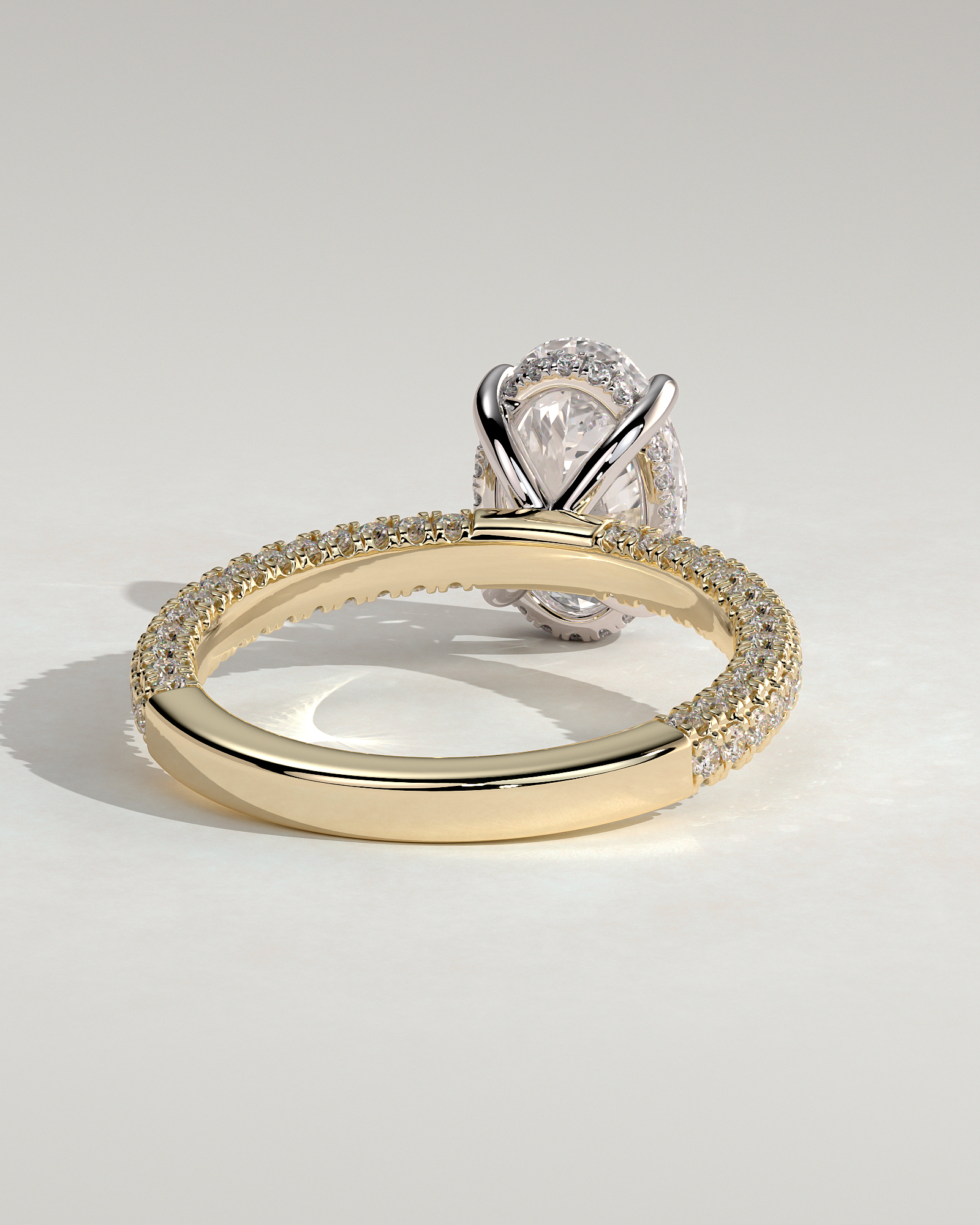Penelope   Oval Solitaire with Hidden Halo and Triple Pav - 18k Yellow Gold / 18k White Gold