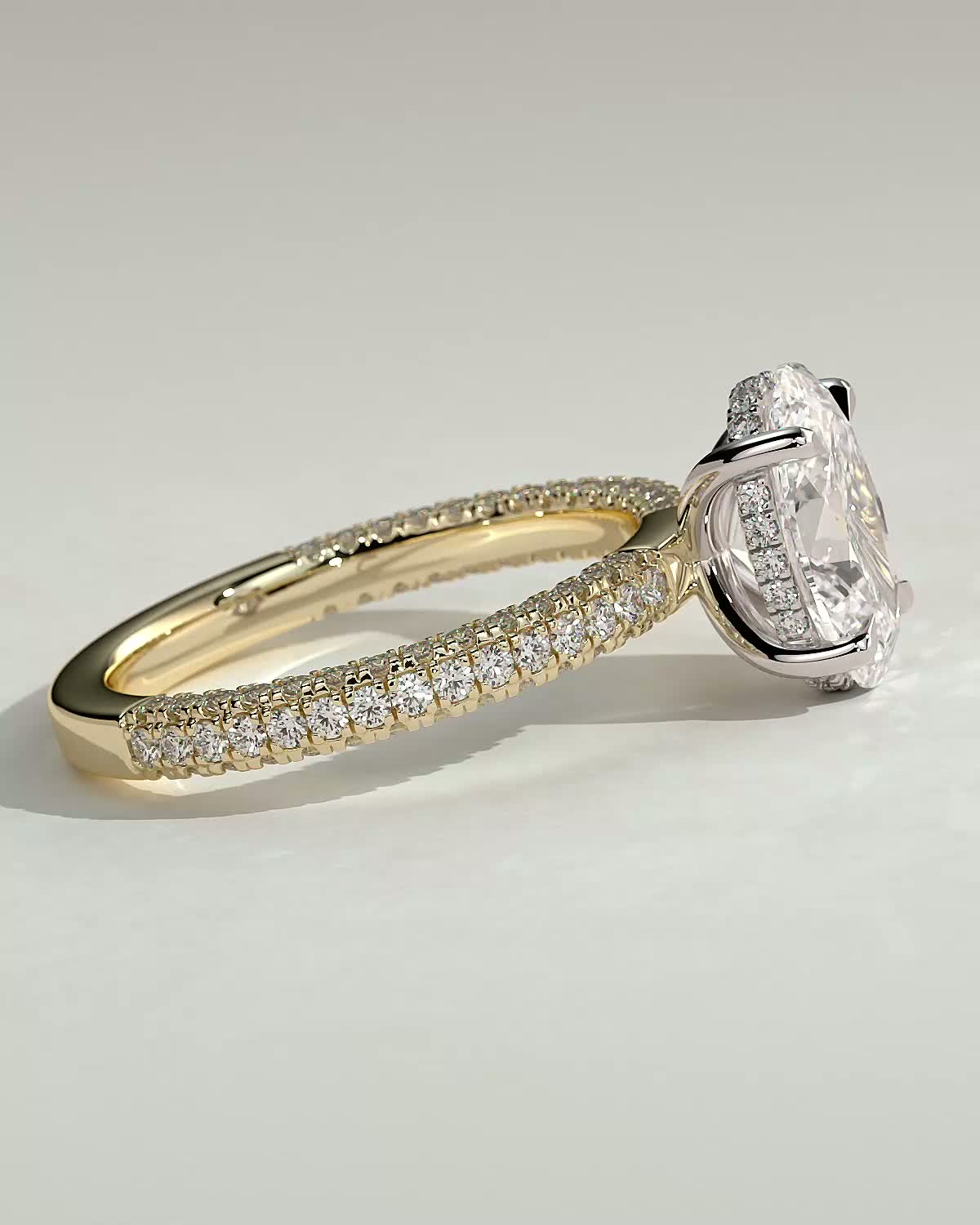 Penelope   Oval Solitaire with Hidden Halo and Triple Pav - 18k Yellow Gold / 18k White Gold