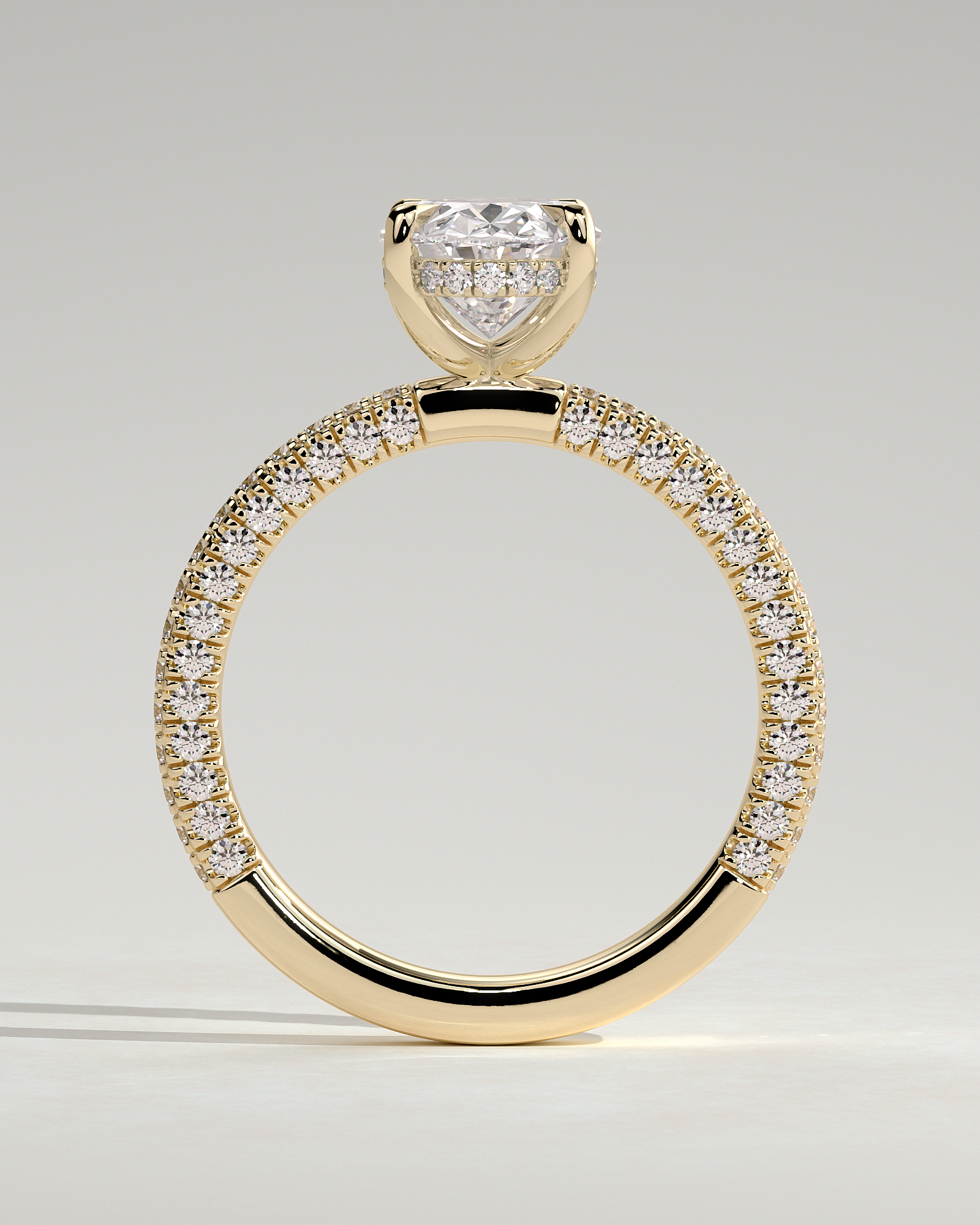 Penelope   Oval Solitaire with Hidden Halo and Triple Pav - 18k Yellow Gold