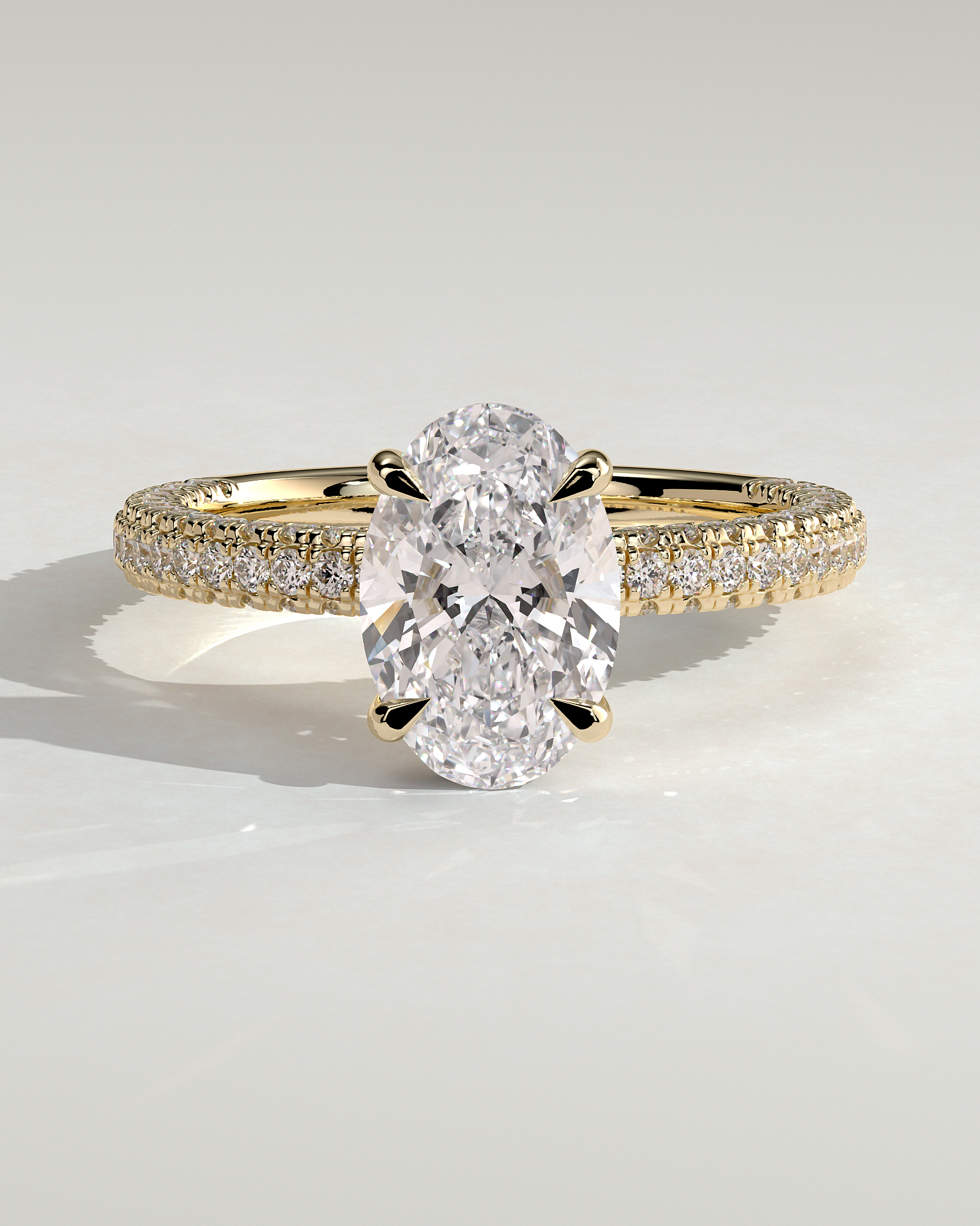 Penelope   Oval Solitaire with Hidden Halo and Triple Pav - 18k Yellow Gold