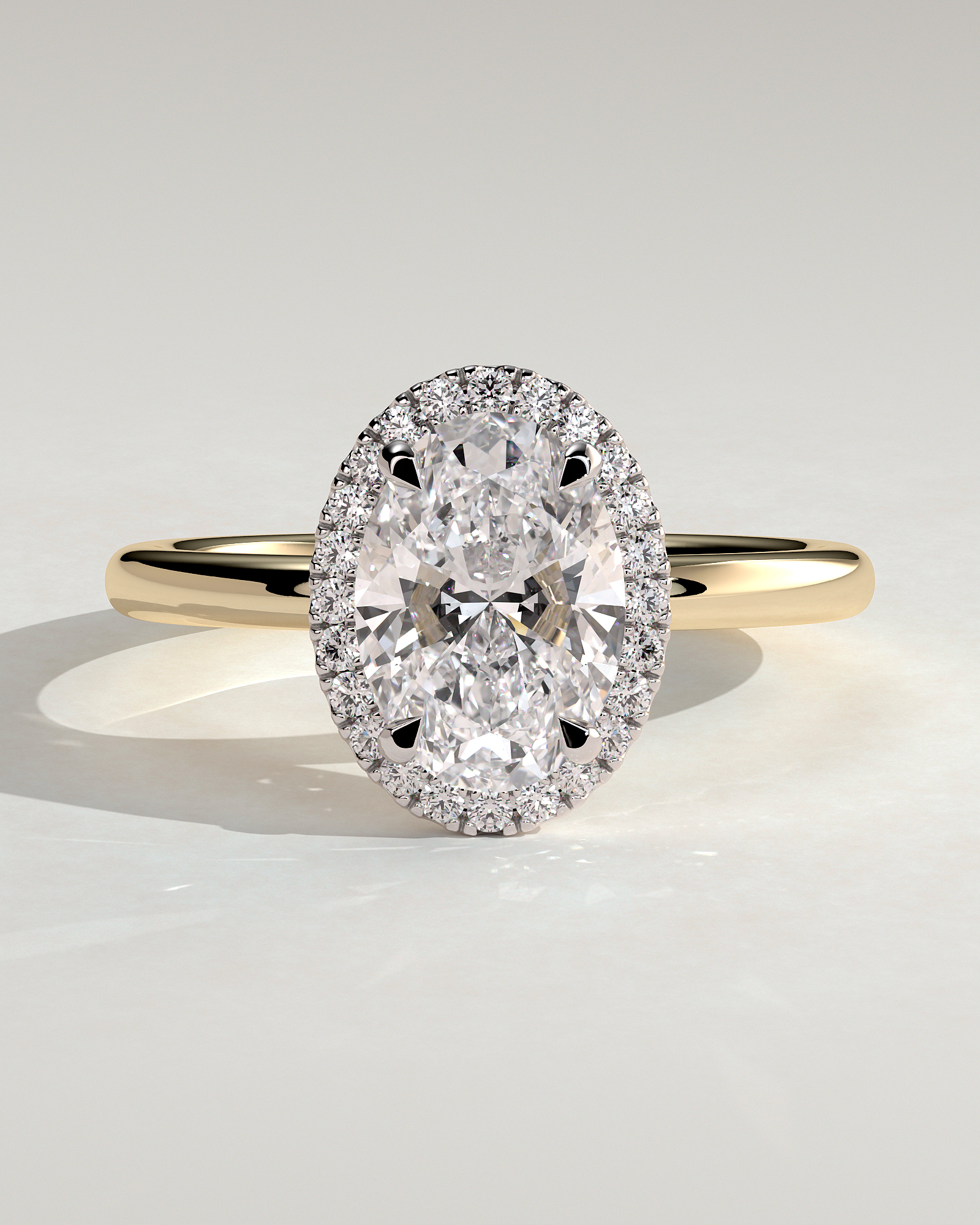 Phoebe  Oval Halo - 18k Yellow Gold / 18k White Gold