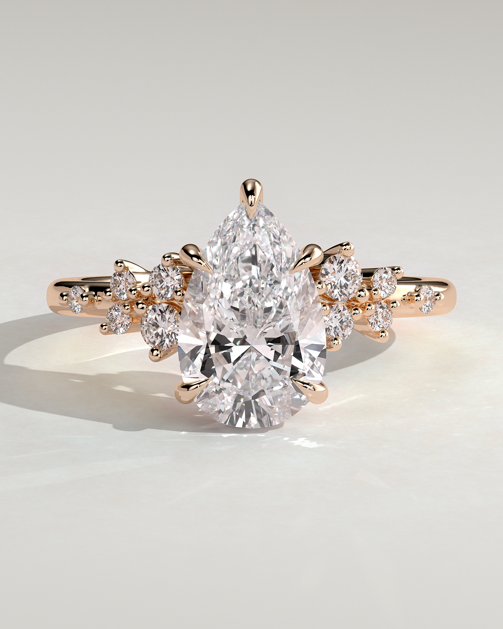 Pear 5 Claw Solitaire with Clustered Round Shoulder Stones Engagement Ring - 18k Rose Gold