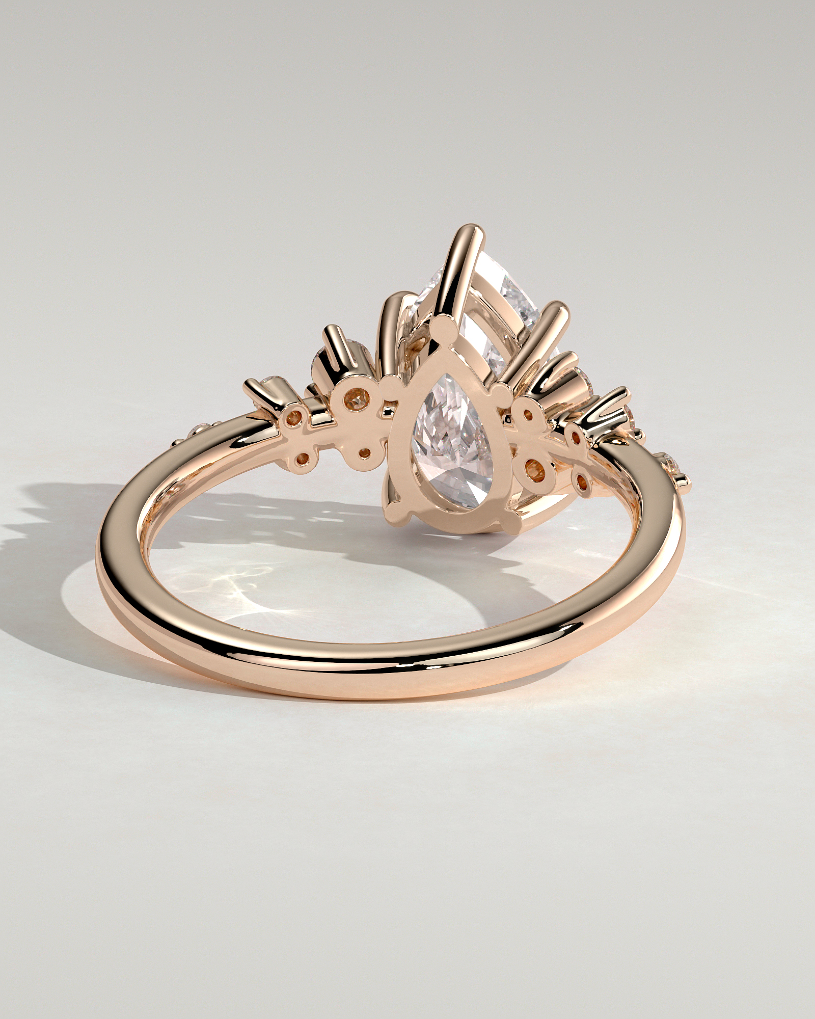 Pear 5 Claw Solitaire with Clustered Round Shoulder Stones Engagement Ring - 18k Rose Gold