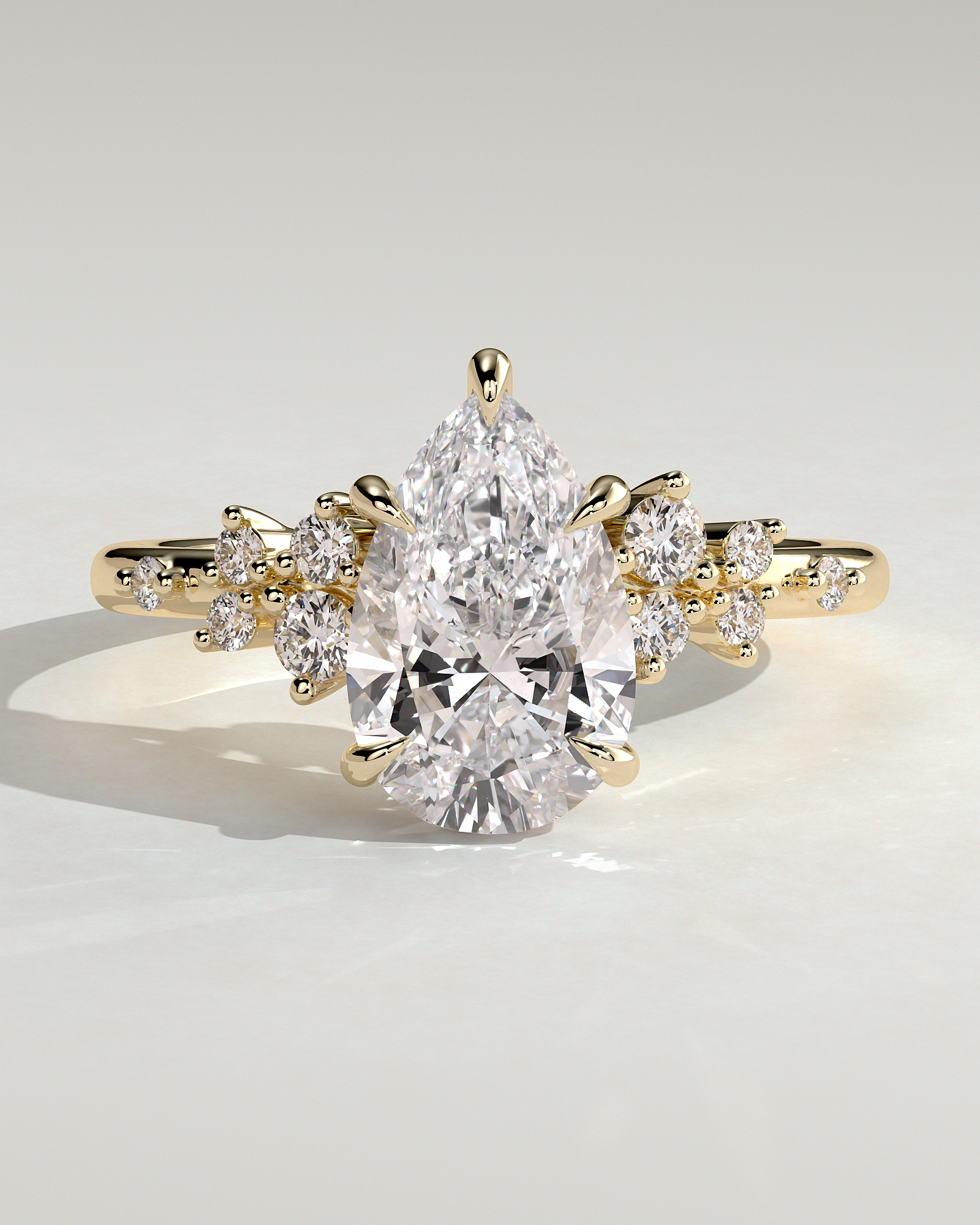 Pear 5 Claw Solitaire with Clustered Round Shoulder Stones Engagement Ring - 18k Yellow Gold