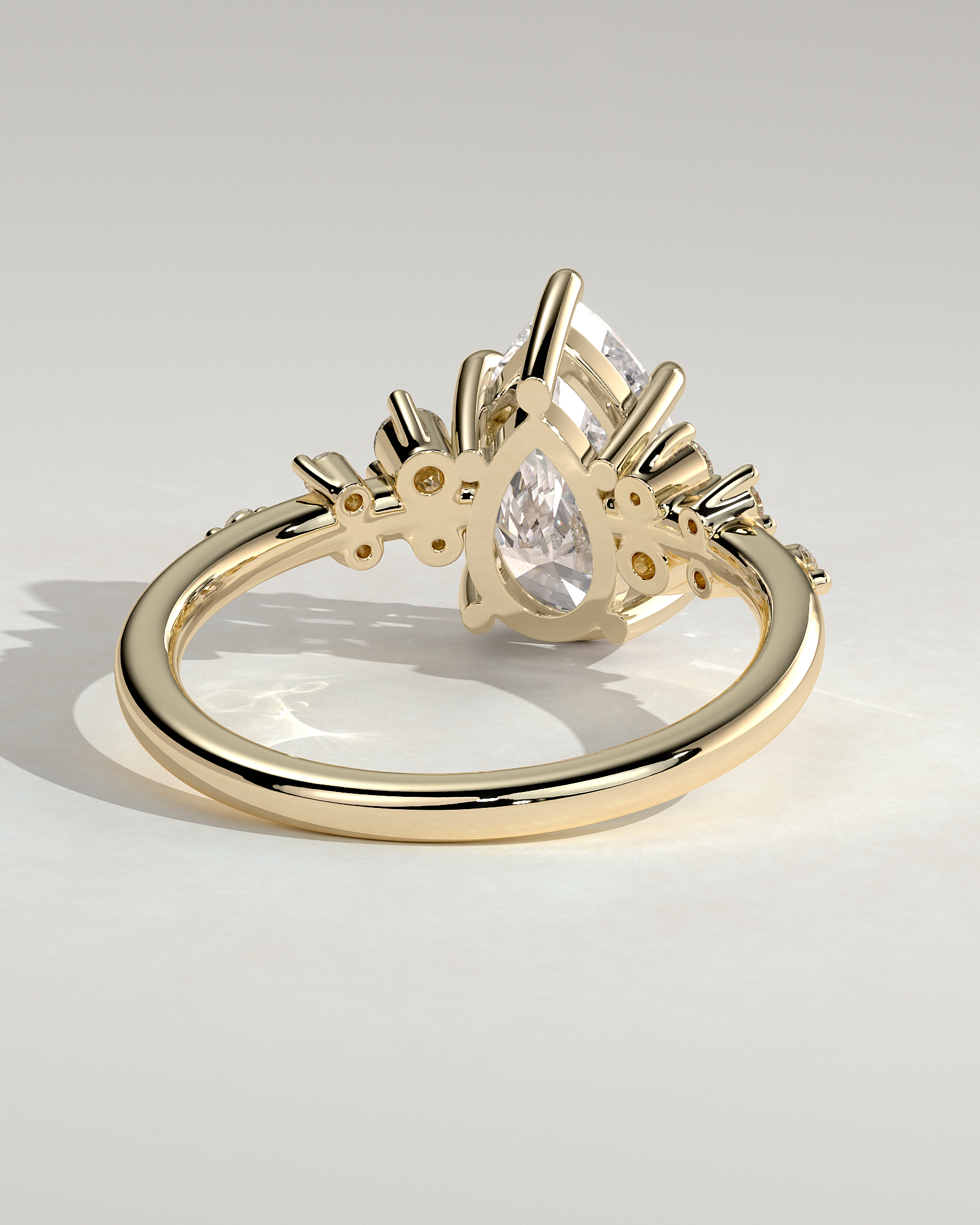 Pear 5 Claw Solitaire with Clustered Round Shoulder Stones Engagement Ring - 18k Yellow Gold
