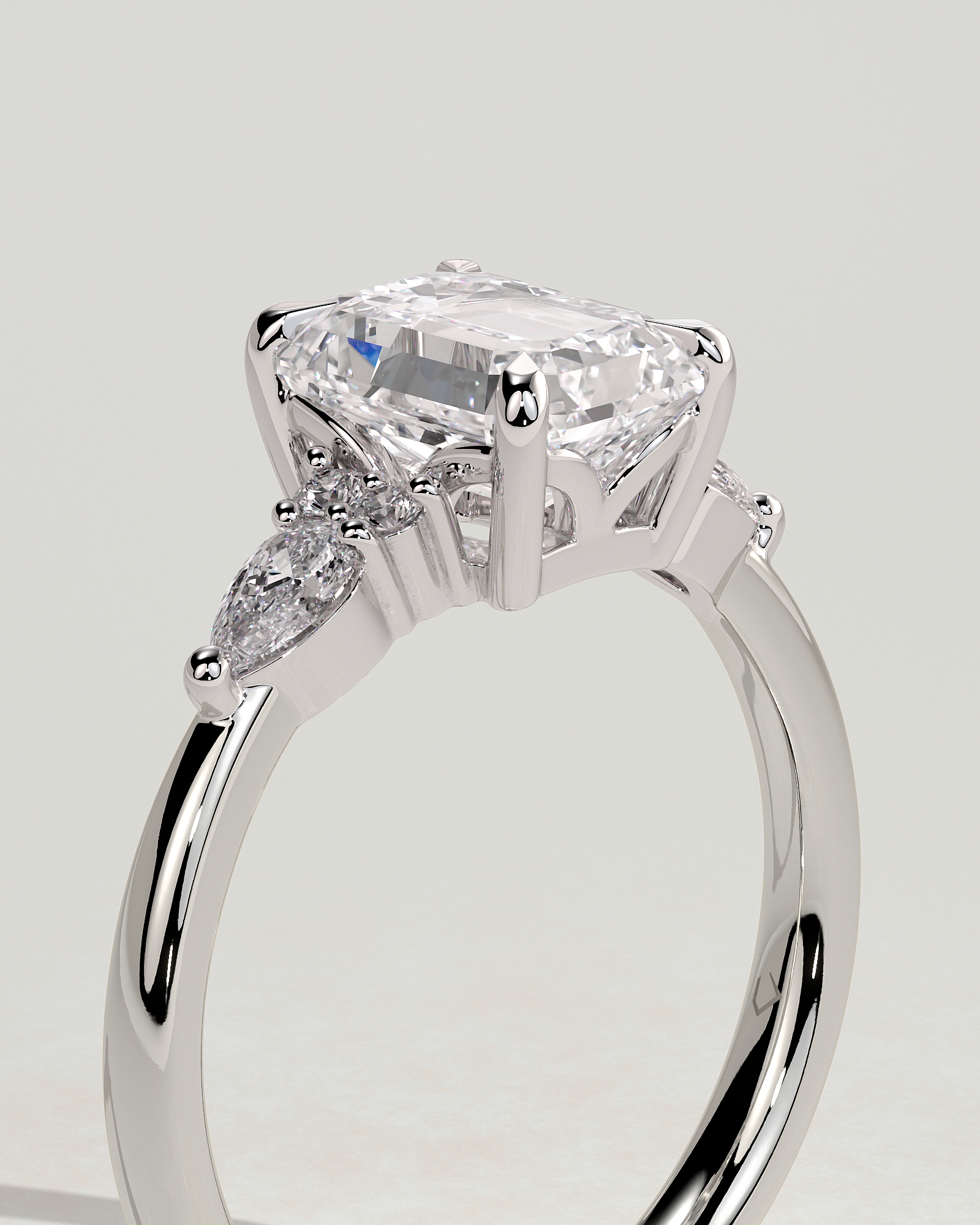 Raleigh - 4 Claw Emerald with Accent Stones - 18k White Gold
