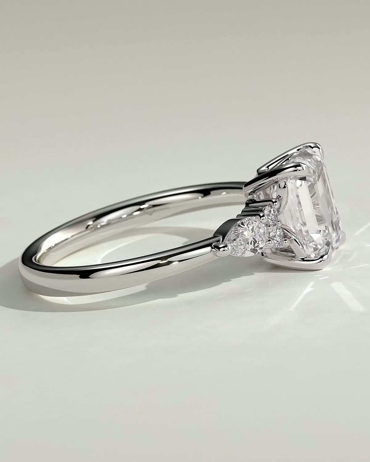 Raleigh - 4 Claw Emerald with Accent Stones - 18k White Gold