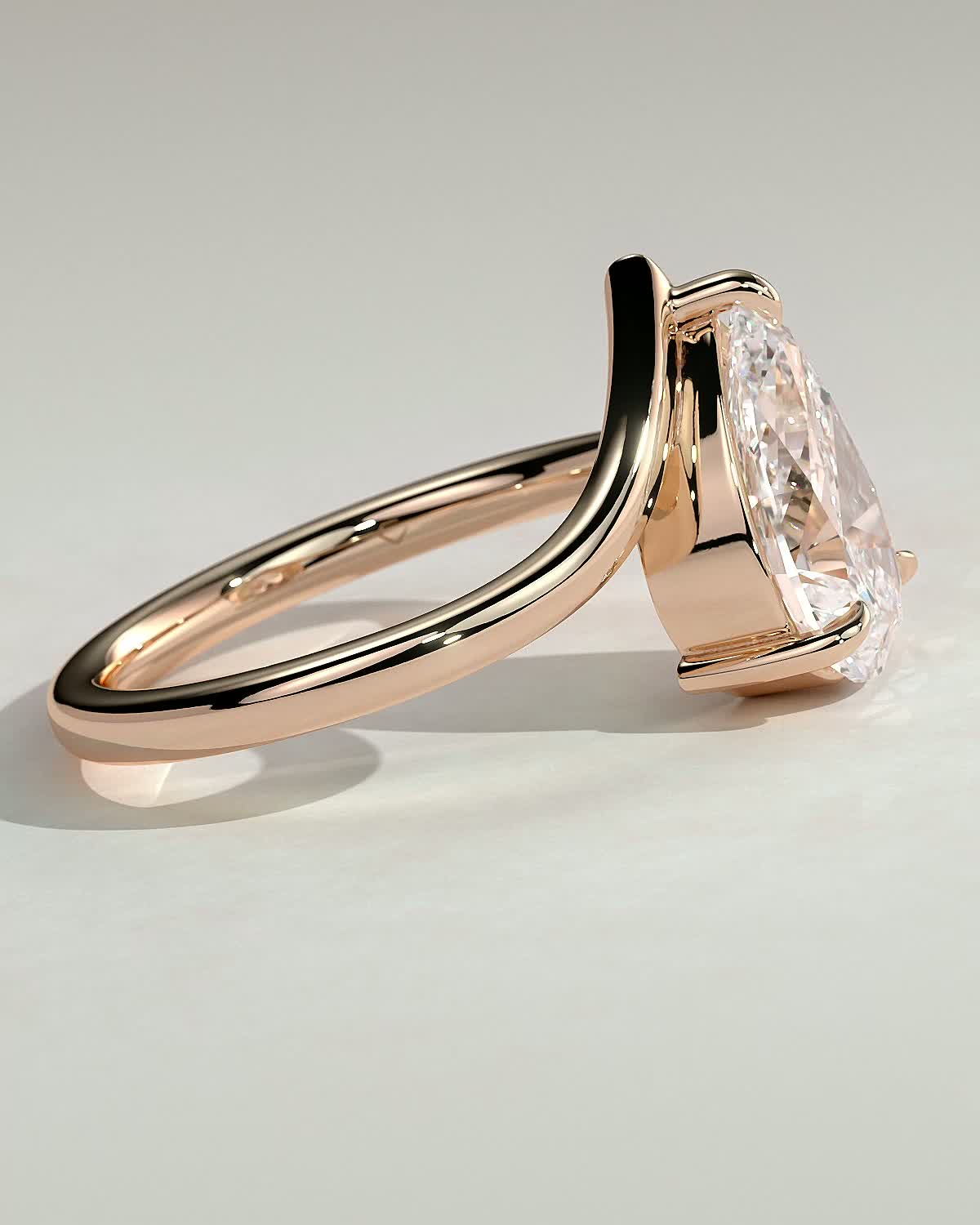 Riley - Pear Solitaire with Curved Band - 18k Rose Gold
