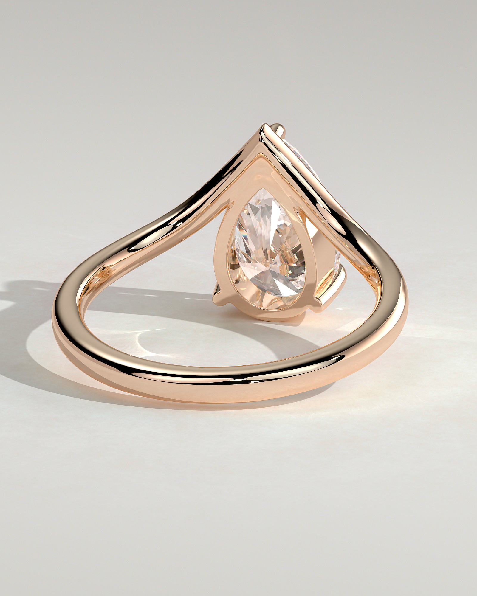 Riley - Pear Solitaire with Curved Band - 18k Rose Gold