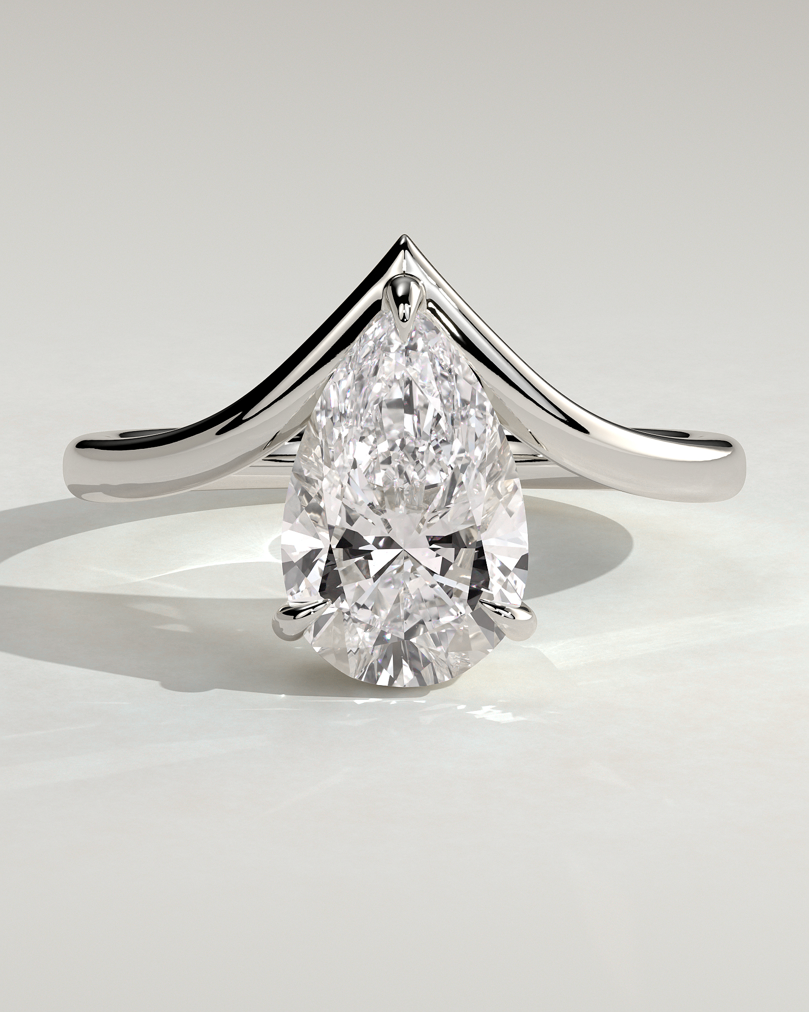 Riley - Pear Solitaire with Curved Band - 18k White Gold