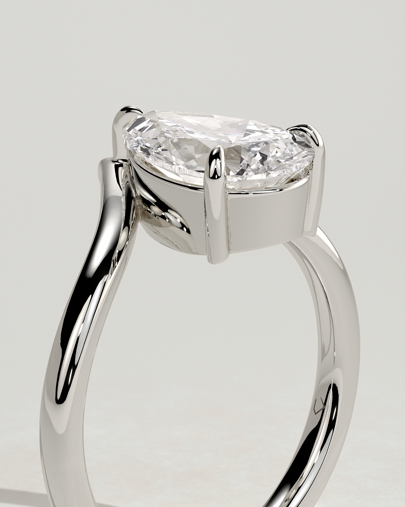 Riley - Pear Solitaire with Curved Band - 18k White Gold