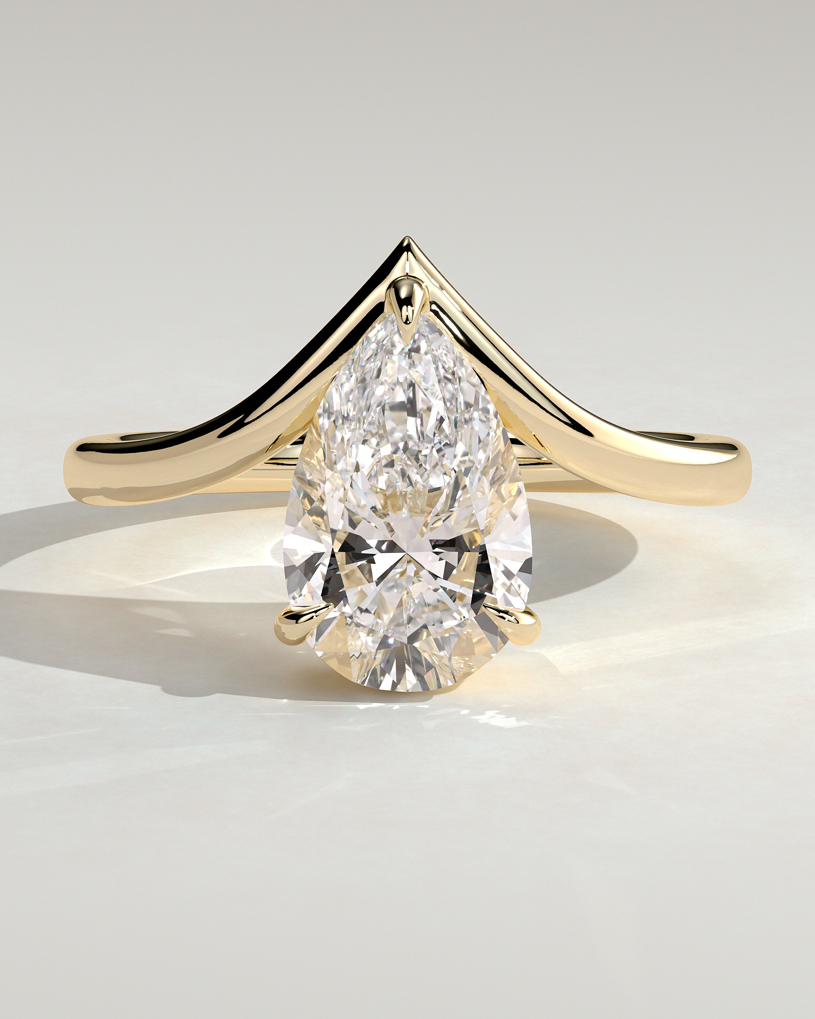Riley - Pear Solitaire with Curved Band - 18k Yellow Gold