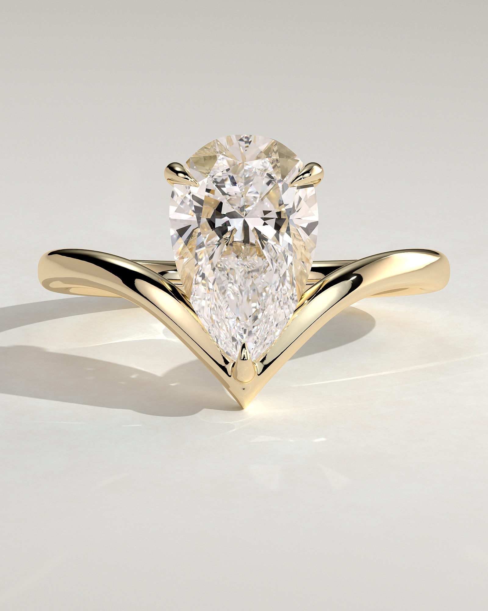 Riley - Pear Solitaire with Curved Band - 18k Yellow Gold