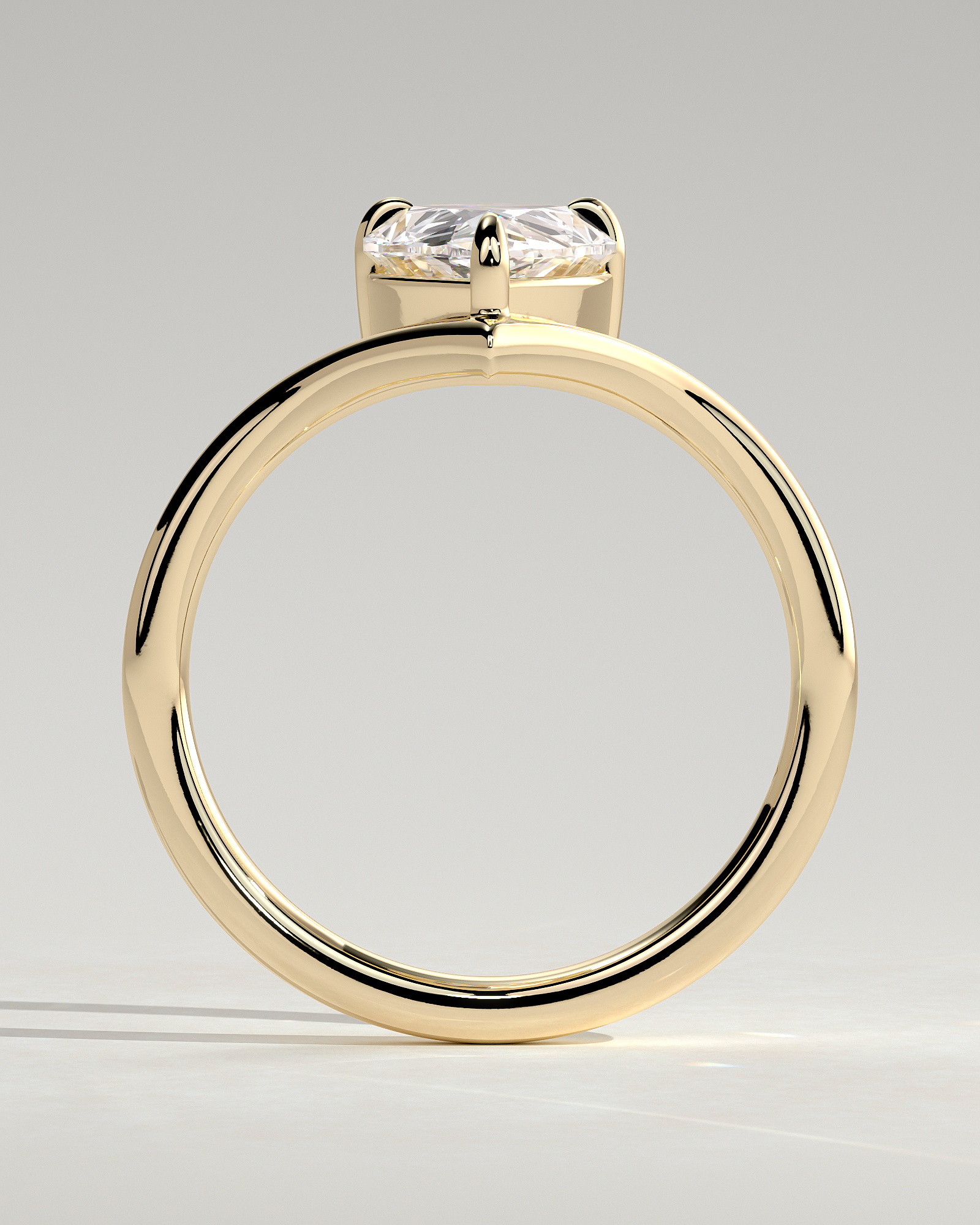 Riley - Pear Solitaire with Curved Band - 18k Yellow Gold