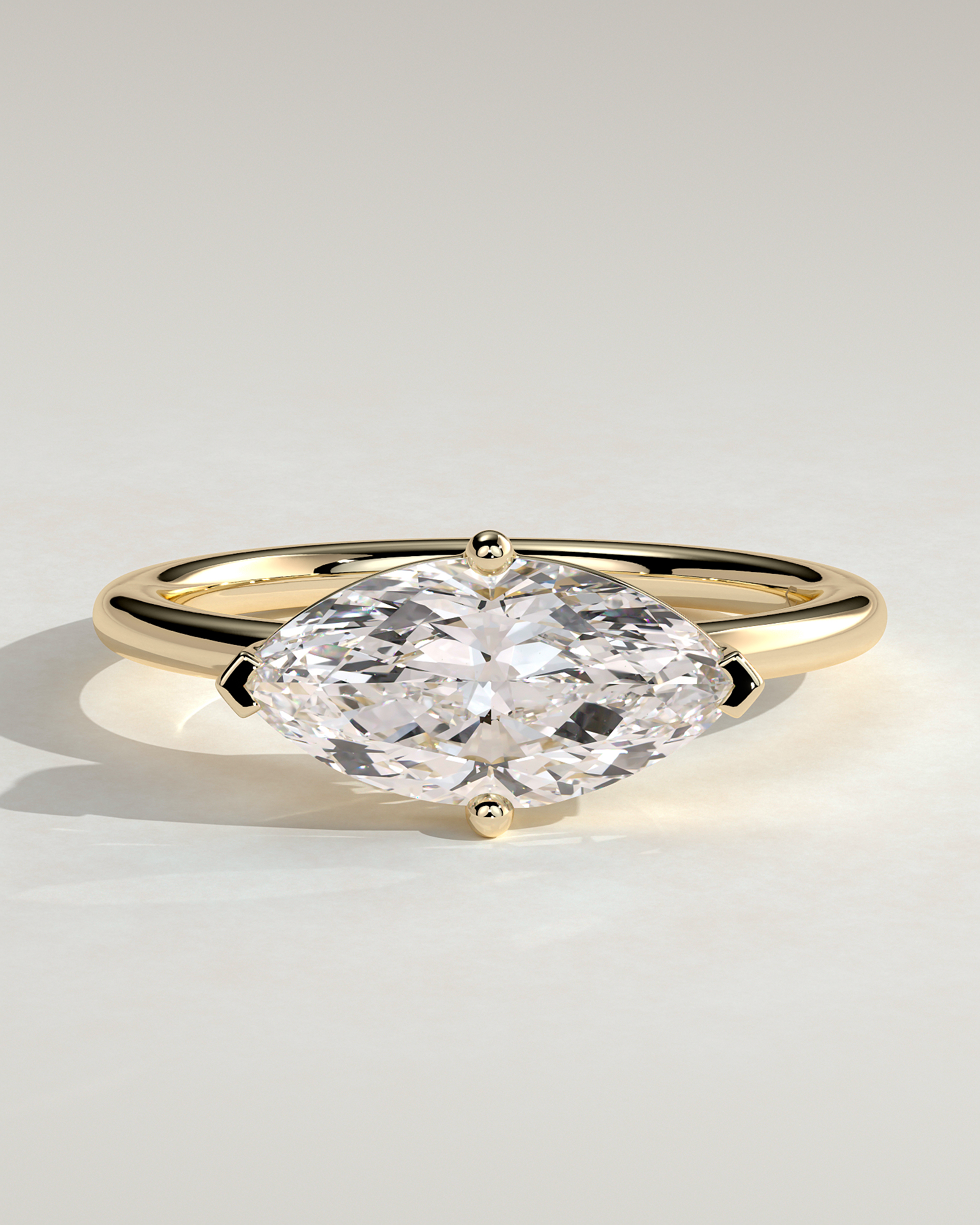 River - East West Marquise Solitaire - 18k Yellow Gold