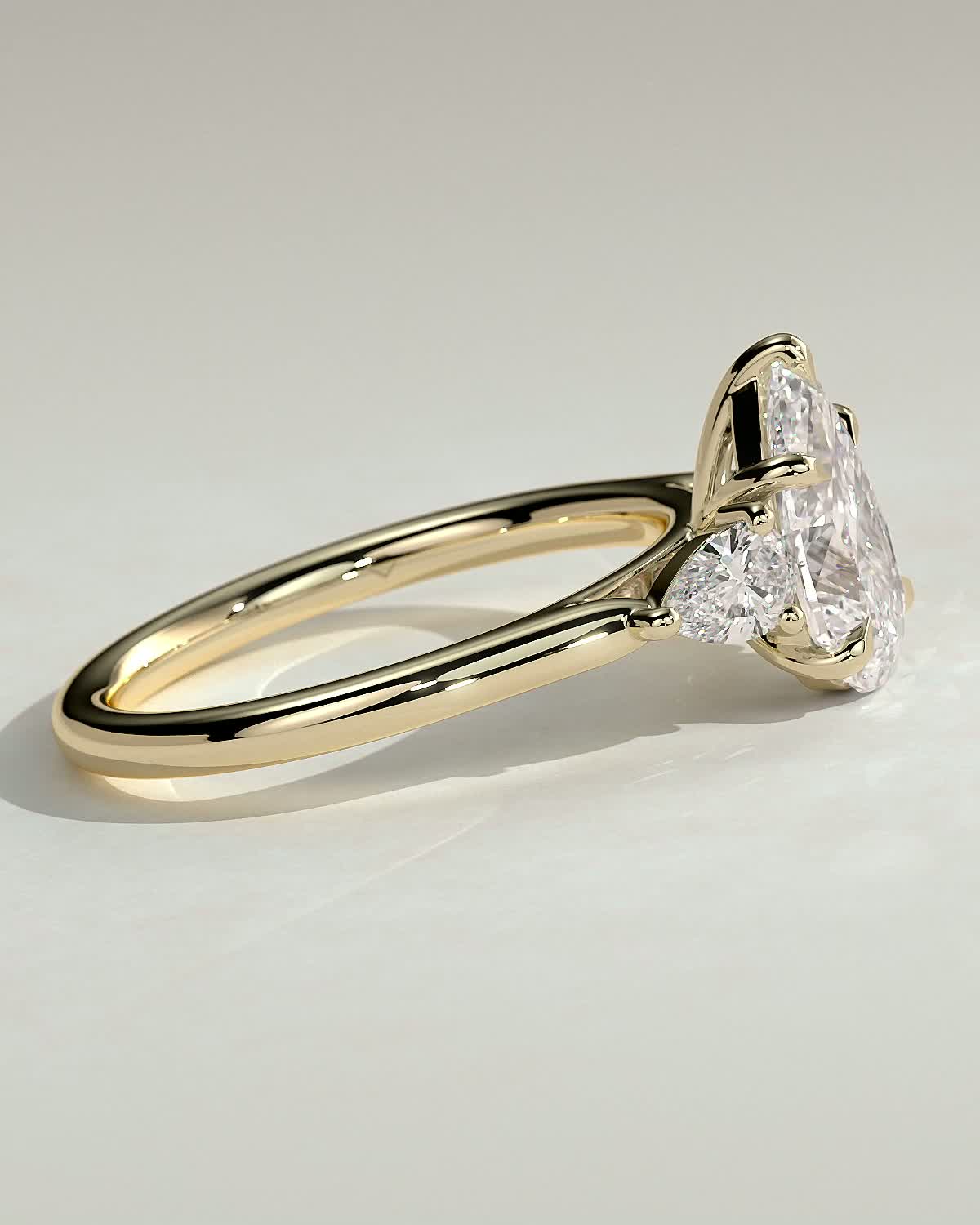 Rosalia - Pear Trilogy with Cathedral Setting - 18k Yellow Gold
