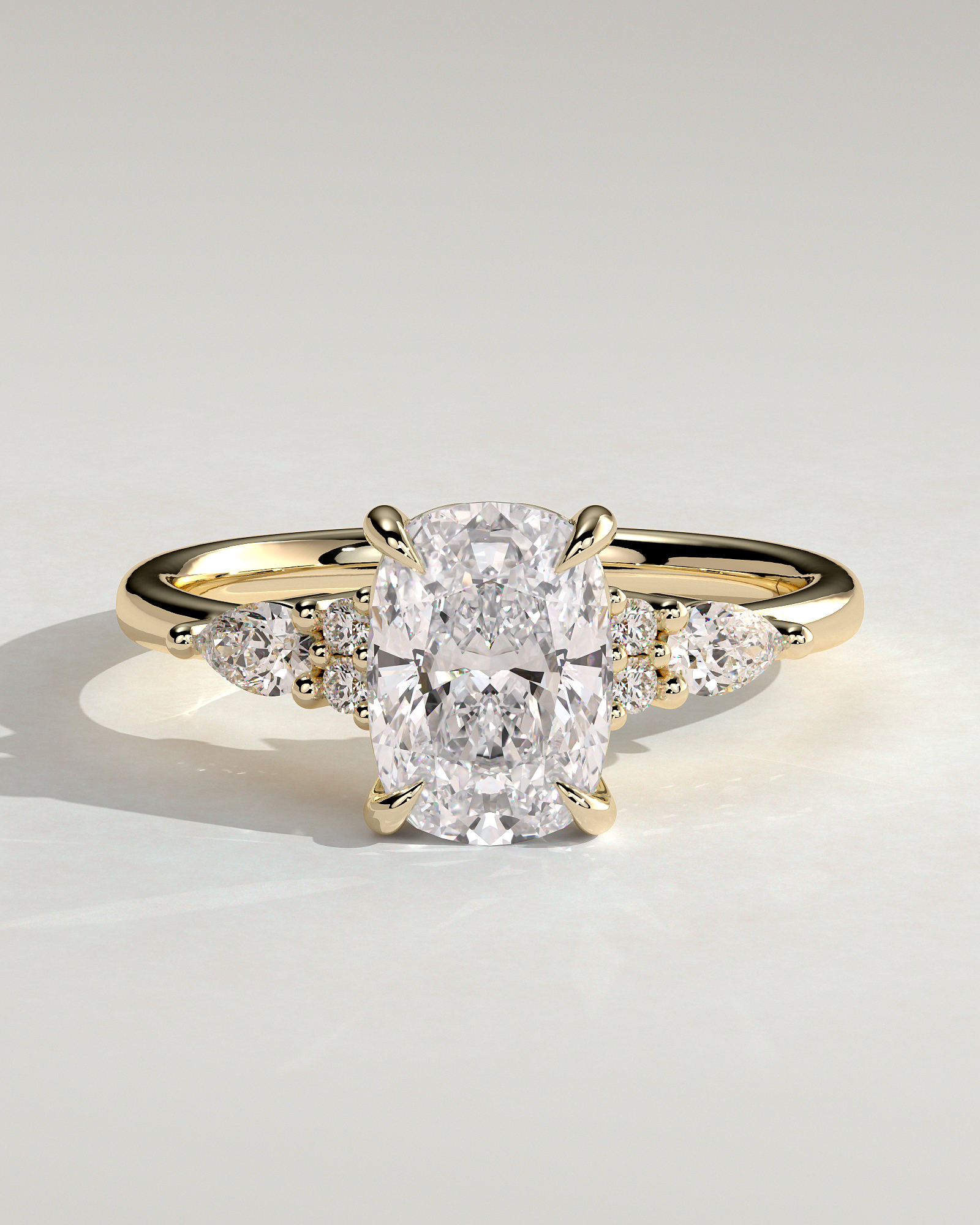 Sadie - Elongated Cushion Trilogy with Round and Pear Stones - 18k Yellow Gold