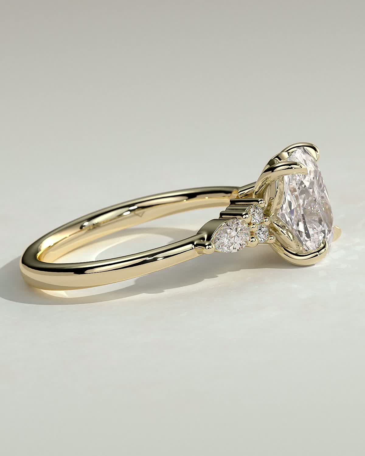 Sadie - Elongated Cushion Trilogy with Round and Pear Stones - 18k Yellow Gold