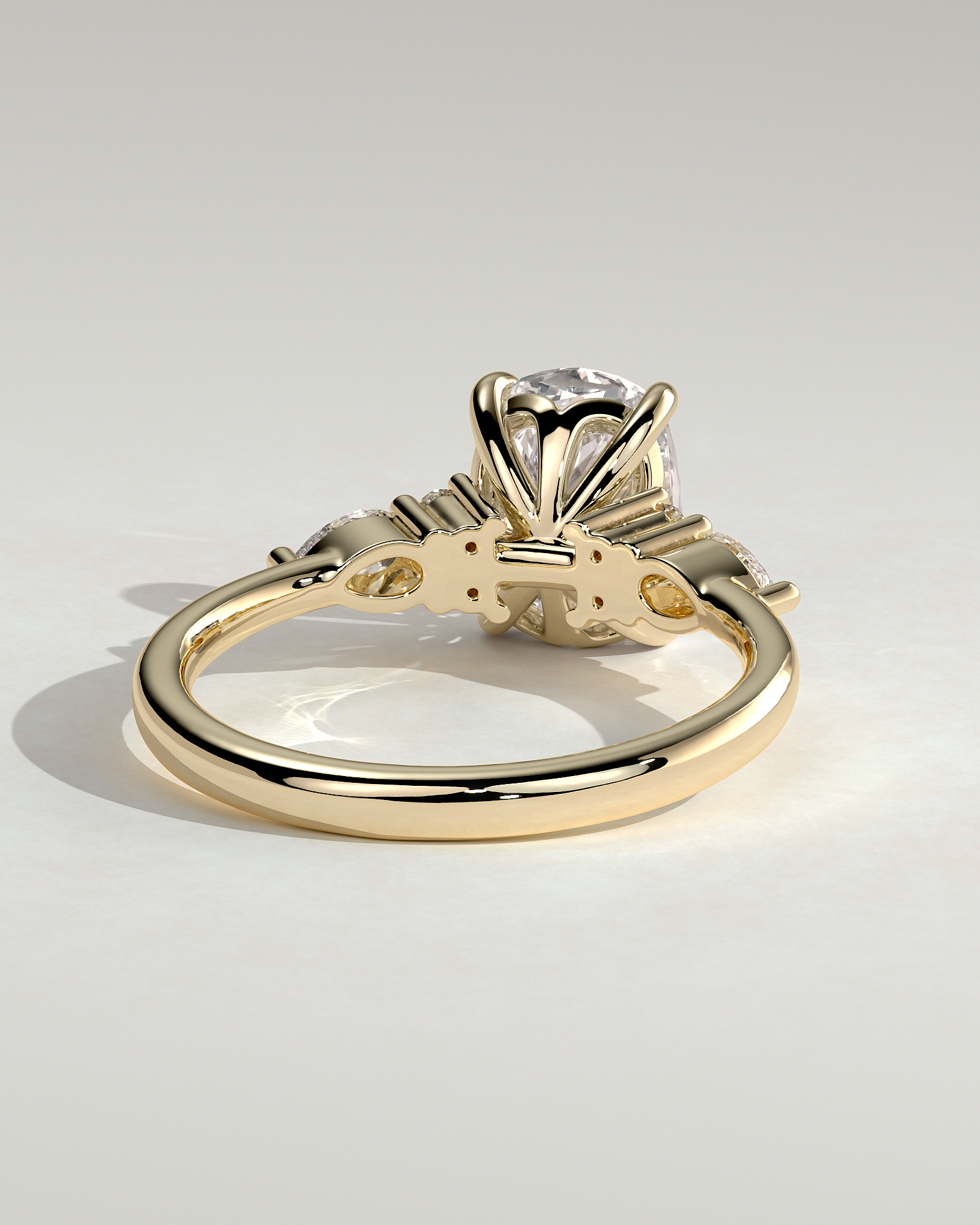 Sadie - Elongated Cushion Trilogy with Round and Pear Stones - 18k Yellow Gold