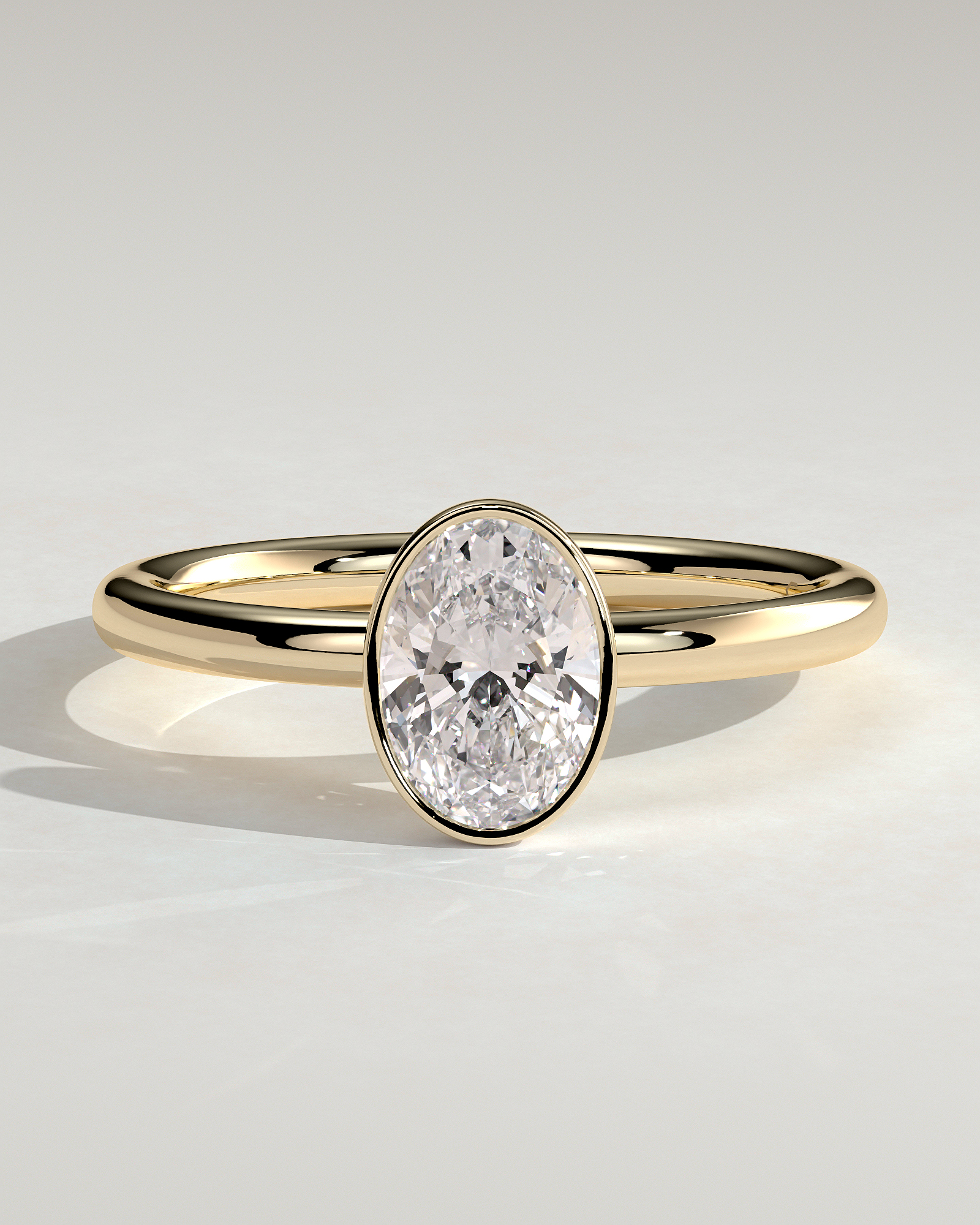 Sage - Bezel Set Oval Solitaire - 18k Yellow Gold
