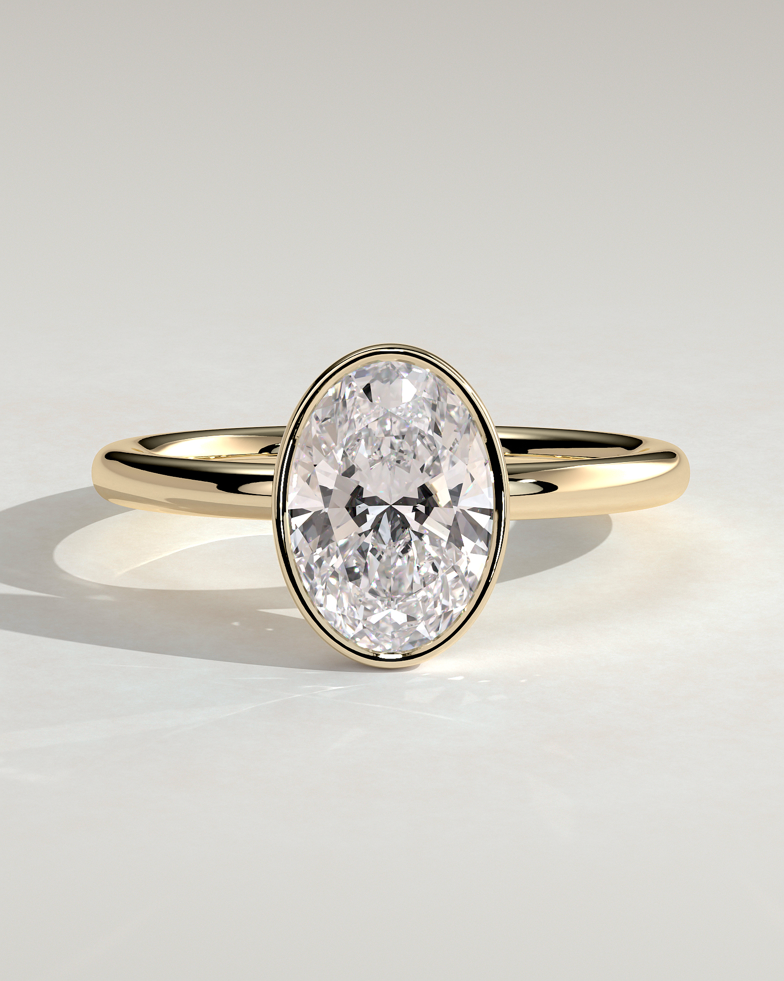 Sage - Bezel Set Oval Solitaire - 18k Yellow Gold