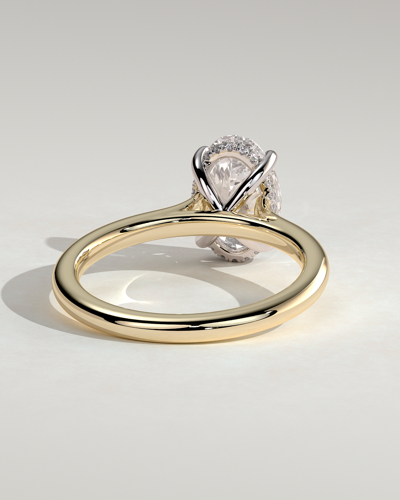 Scarlett - Oval 4 Claw Solitaire with Hidden Halo and Cathedral Setting Engagement Ring - 18k Yellow Gold / 18k White Gold