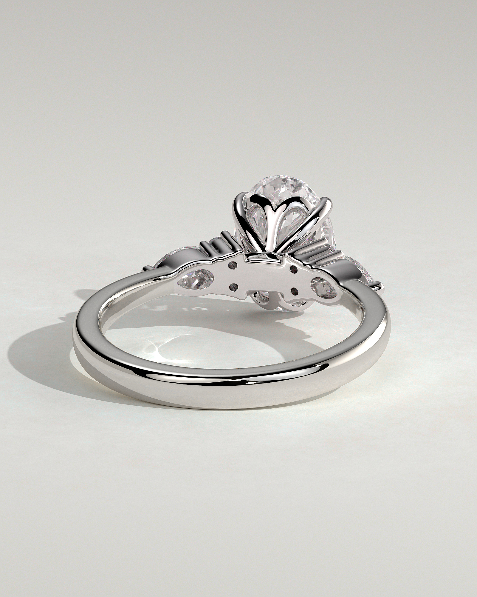 Sheridan  Oval Trilogy with Round and Pear Stones - 18k White Gold High Setting