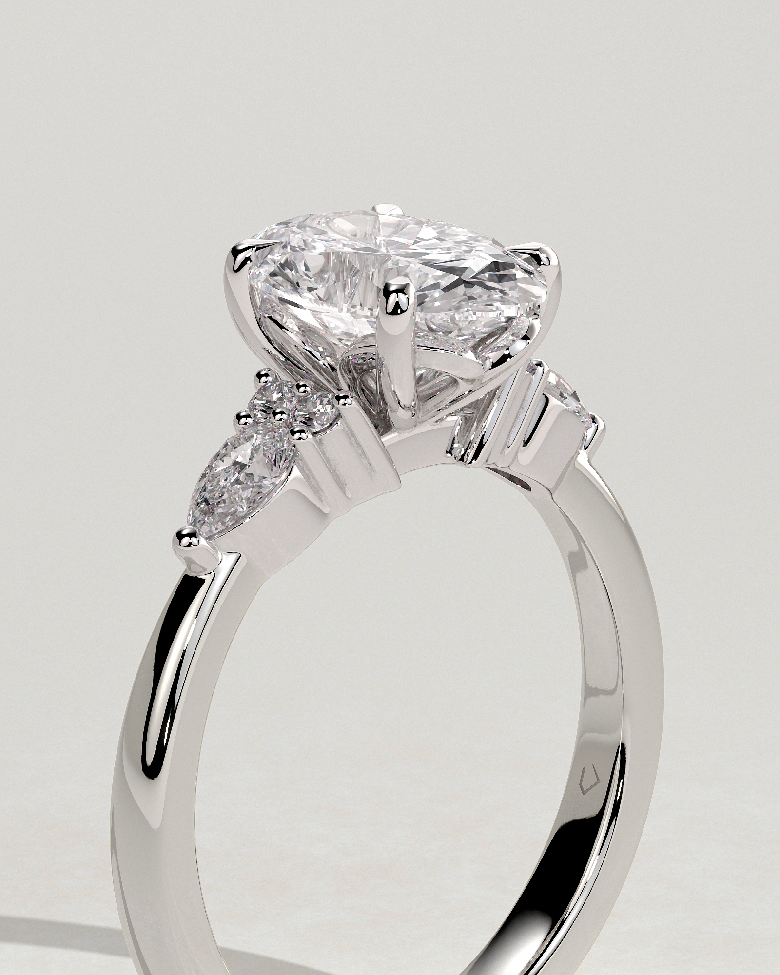 Sheridan  Oval Trilogy with Round and Pear Stones - 18k White Gold High Setting