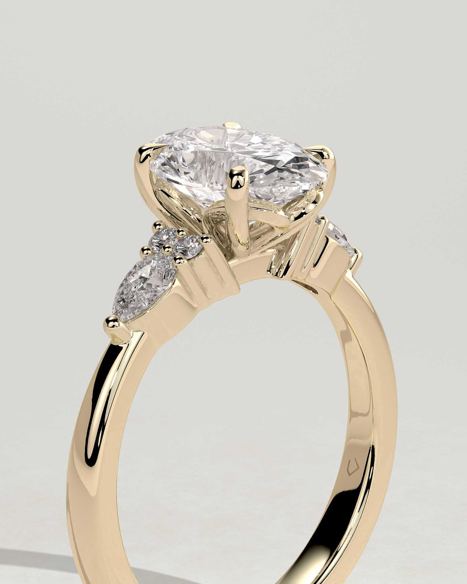 Sheridan  Oval Trilogy with Round and Pear Stones - 18k Yellow Gold High Setting