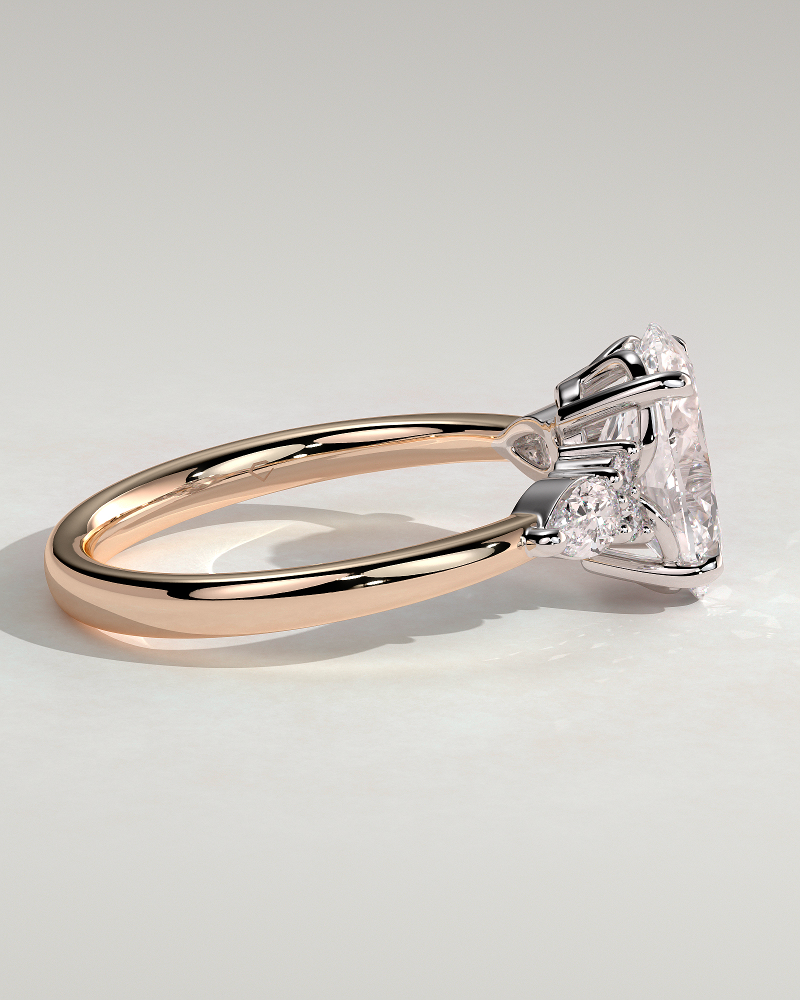 Sheridan  Oval Trilogy with Round and Pear Stones - 18k Rose Gold / 18k White Gold Low Setting