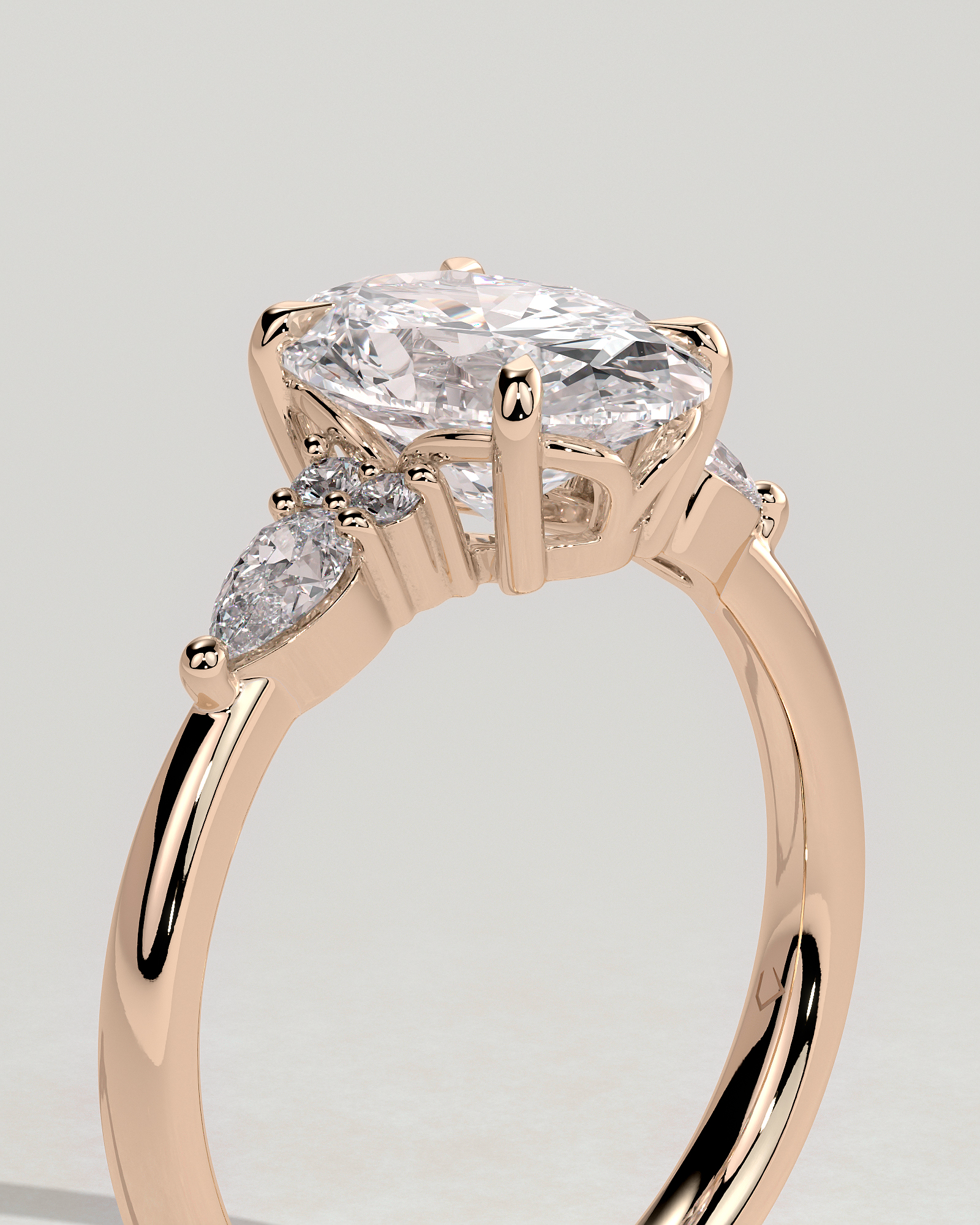 Sheridan  Oval Trilogy with Round and Pear Stones - 18k Rose Gold Low Setting
