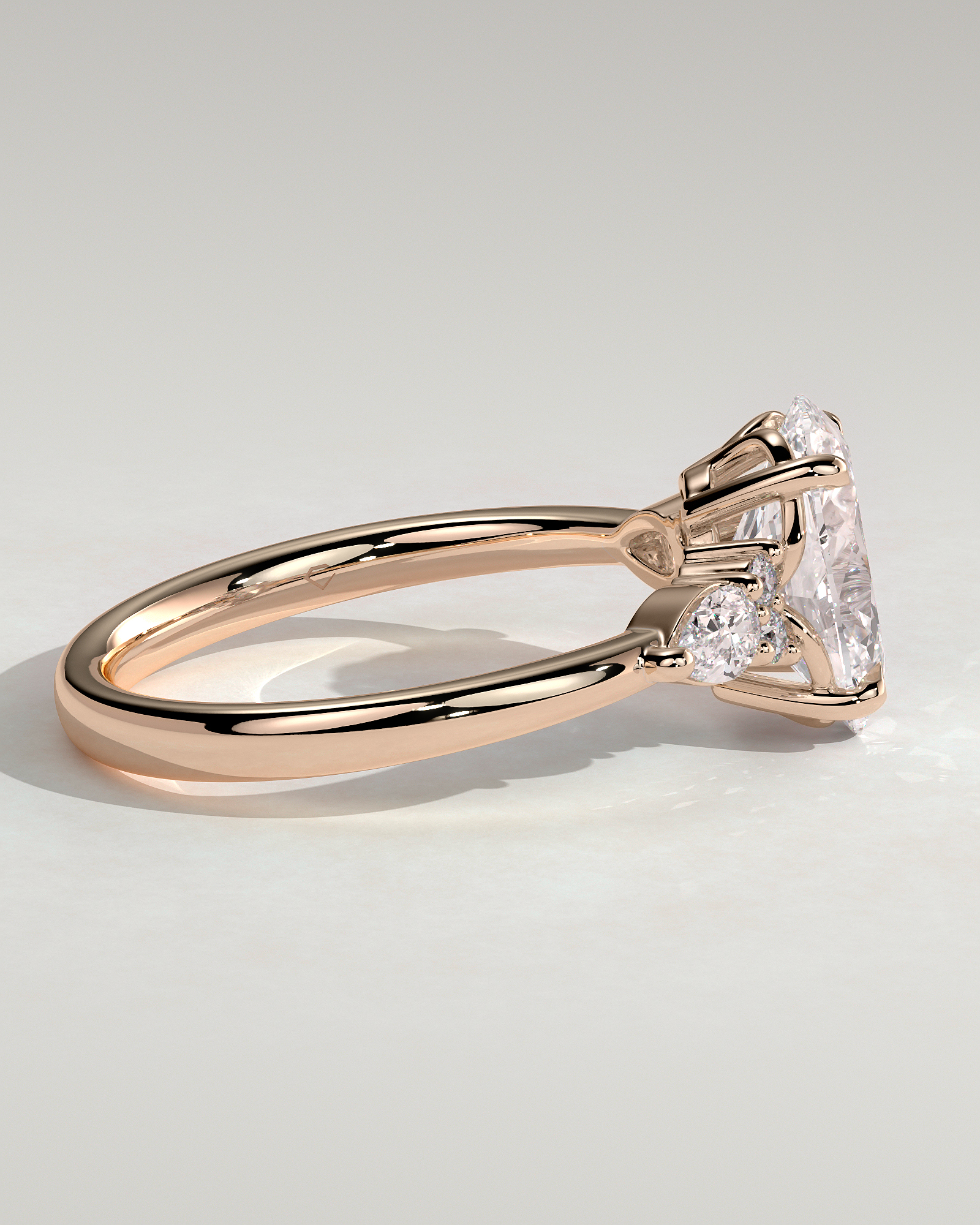 Sheridan  Oval Trilogy with Round and Pear Stones - 18k Rose Gold Low Setting