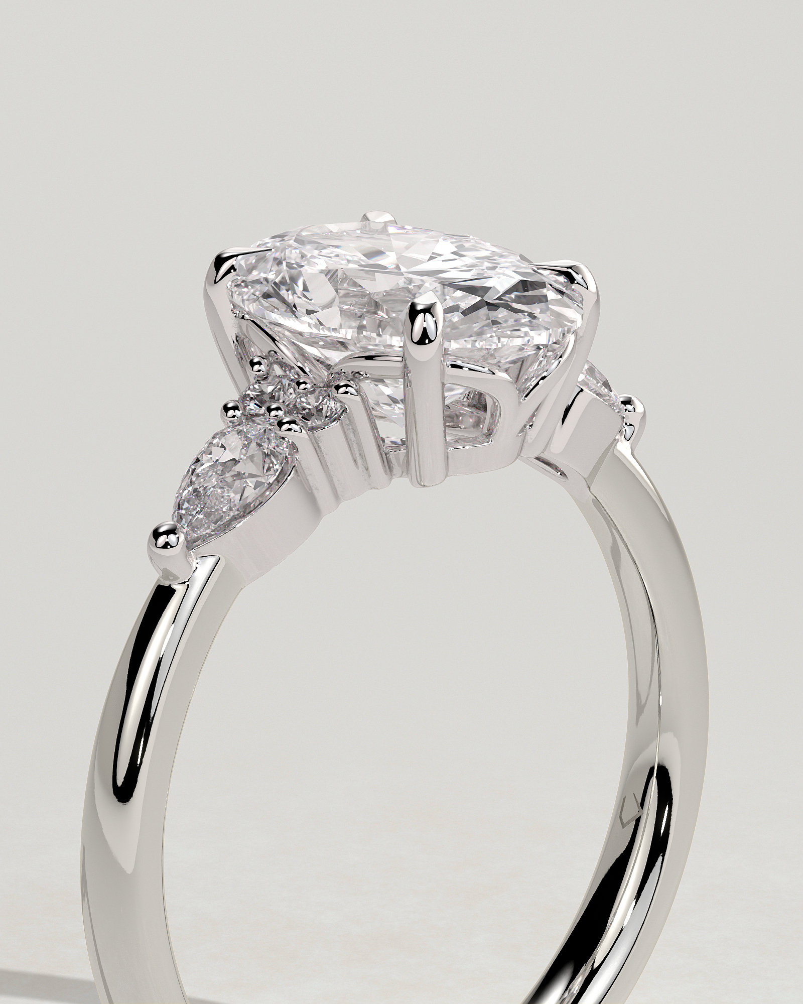Sheridan  Oval Trilogy with Round and Pear Stones - 18k White Gold Low Setting