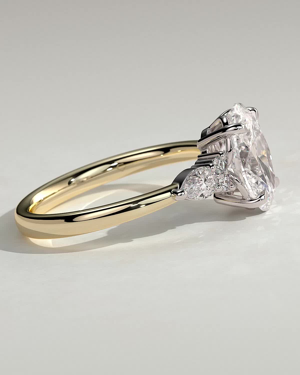 Sheridan - Oval 4 Claw Solitaire with Pear Accents and Round Shoulder Stones Engagement Ring - 18k Yellow Gold / 18k White Gold Low Setting