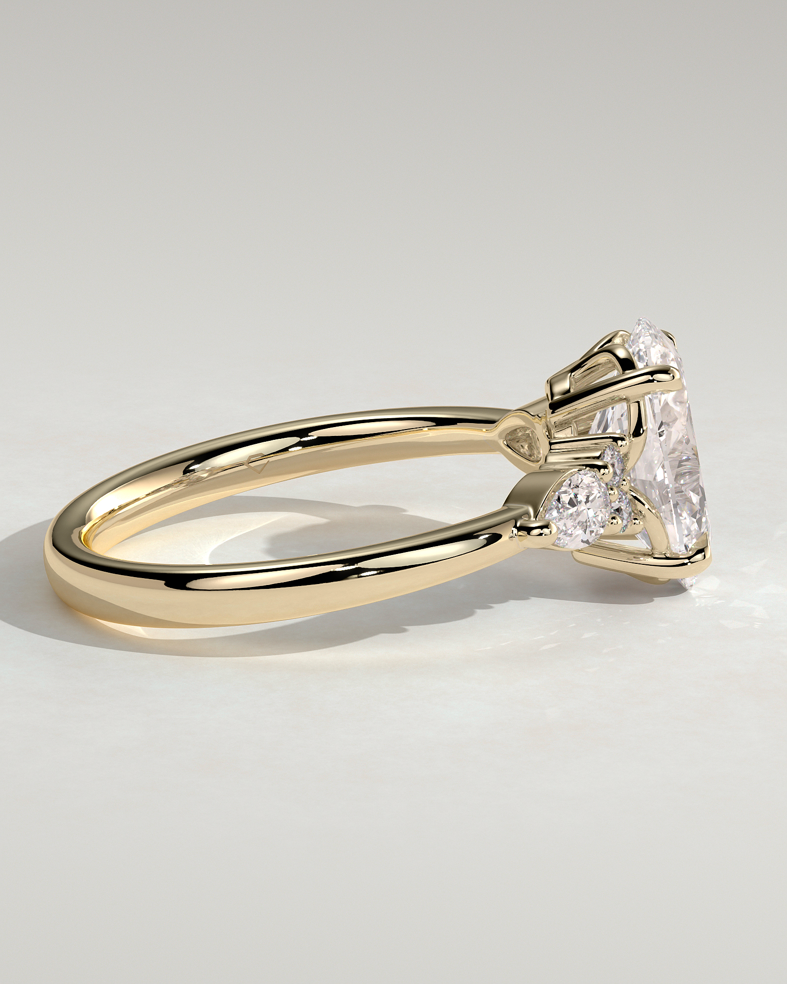 Sheridan  Oval Trilogy with Round and Pear Stones - 18k Yellow Gold Low Setting