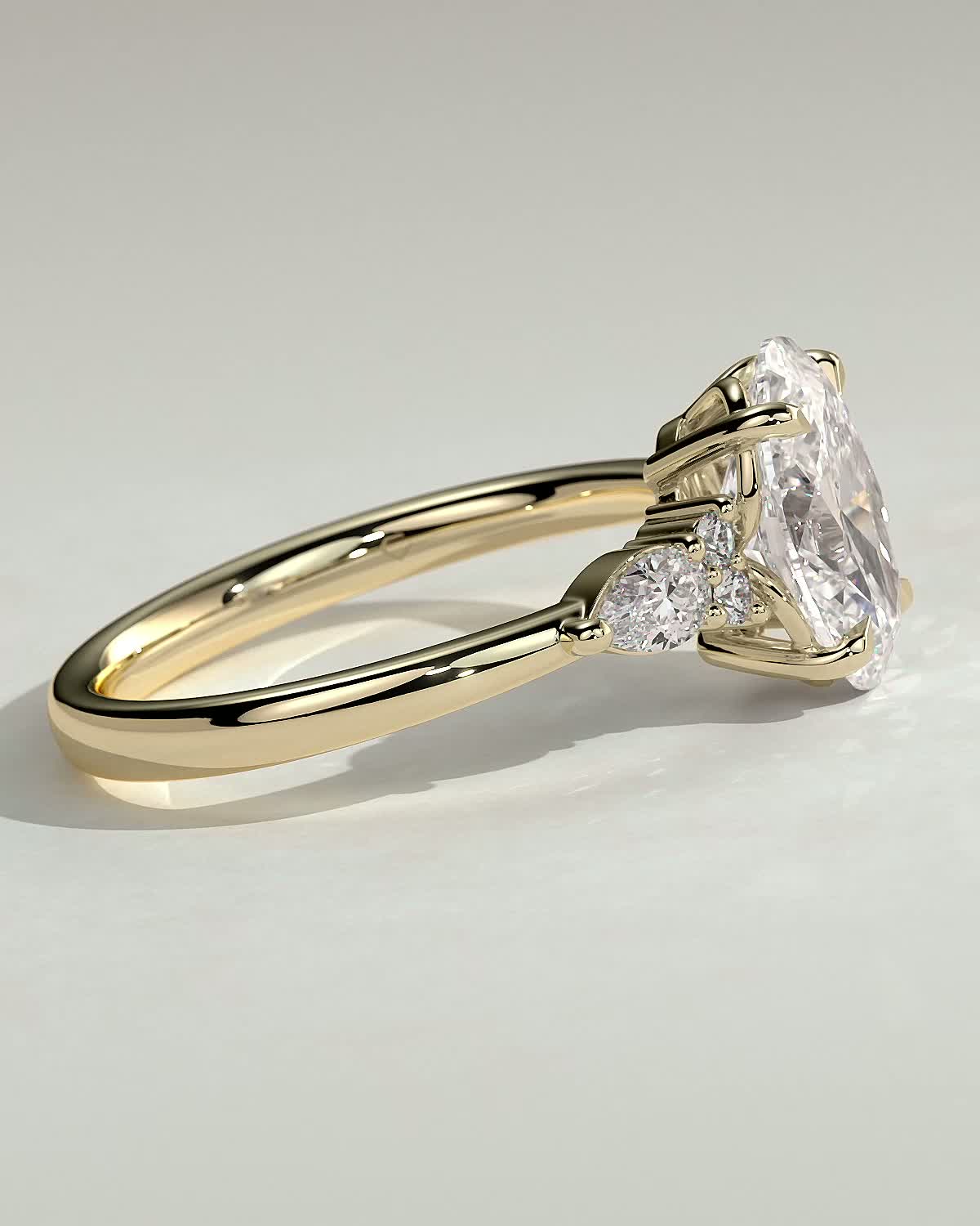 Sheridan  Oval Trilogy with Round and Pear Stones - 18k Yellow Gold Low Setting