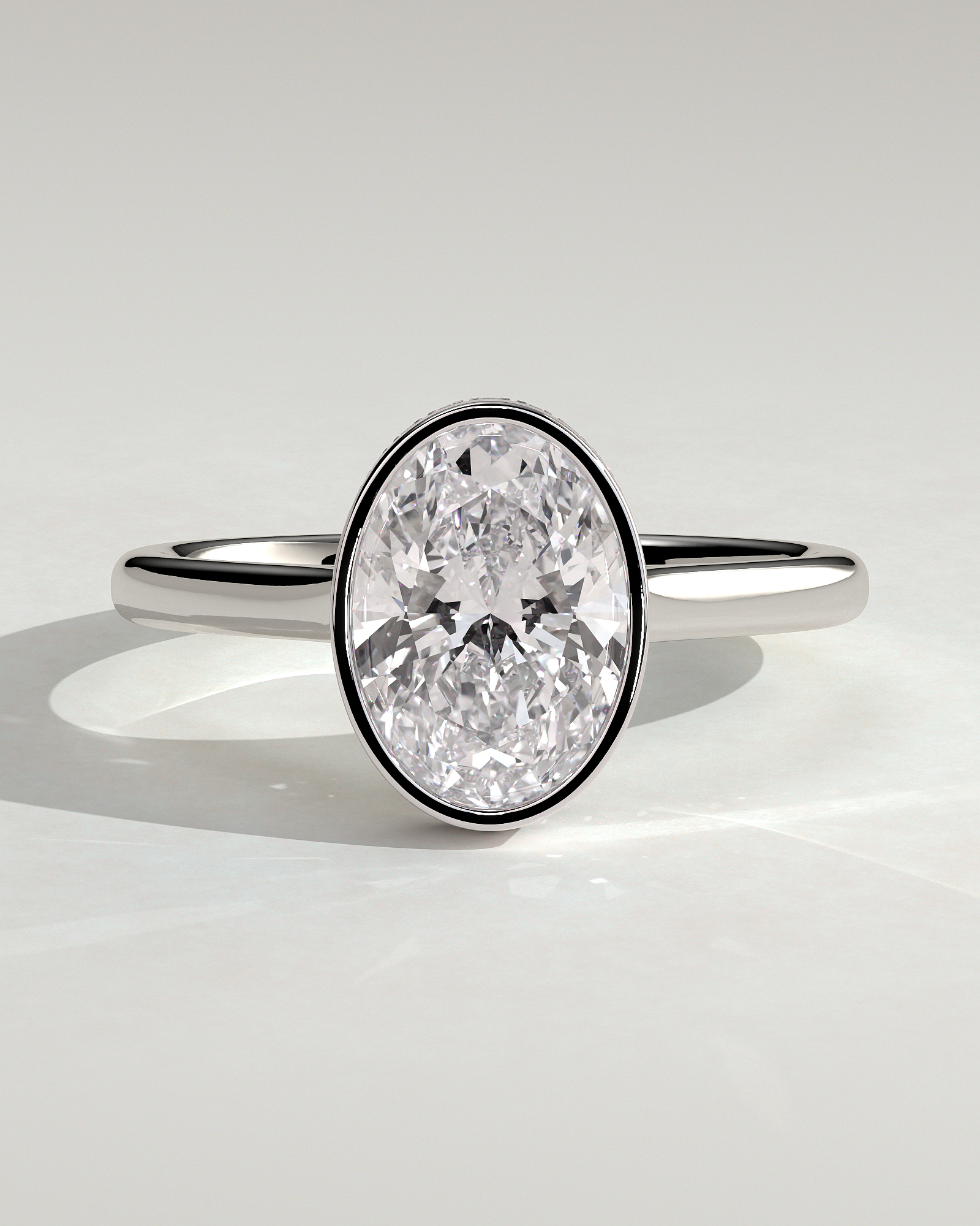 Oval Bezel Solitaire with Hidden Halo and Cathedral Setting Engagement Ring - 18k White Gold