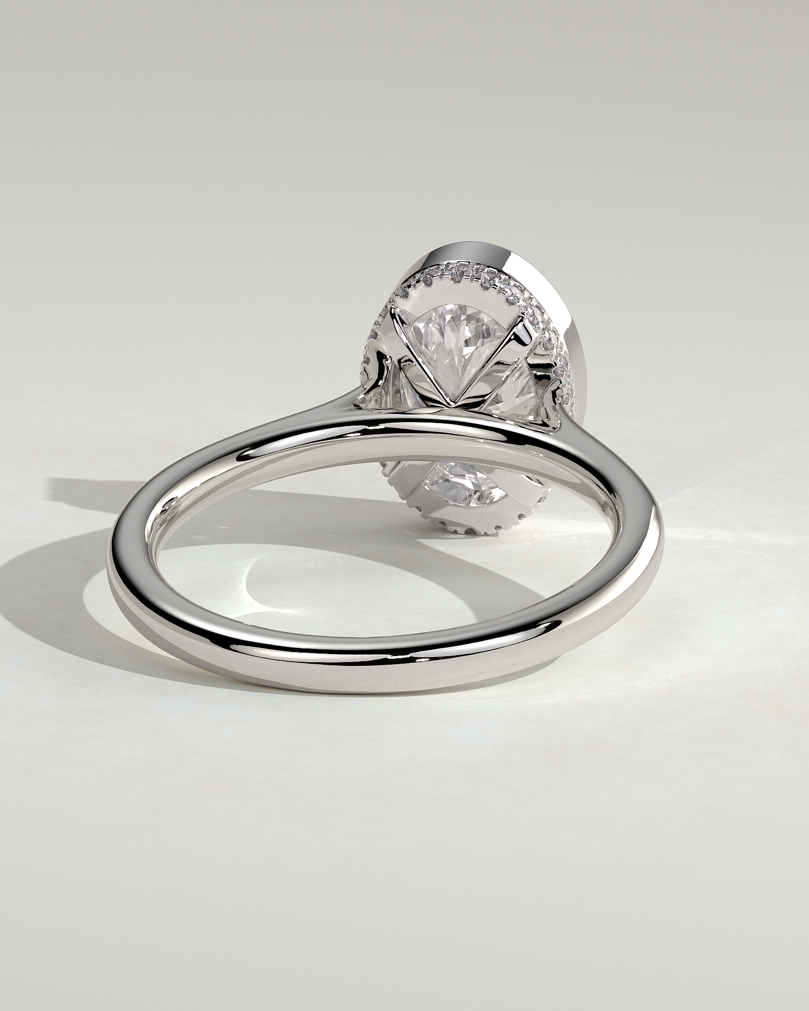 Oval Bezel Solitaire with Hidden Halo and Cathedral Setting Engagement Ring - 18k White Gold