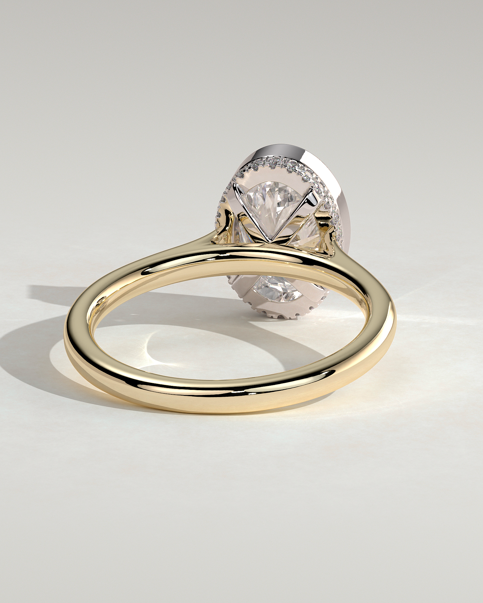 Oval Bezel Solitaire with Hidden Halo and Cathedral Setting Engagement Ring - 18k Yellow Gold / 18k White Gold
