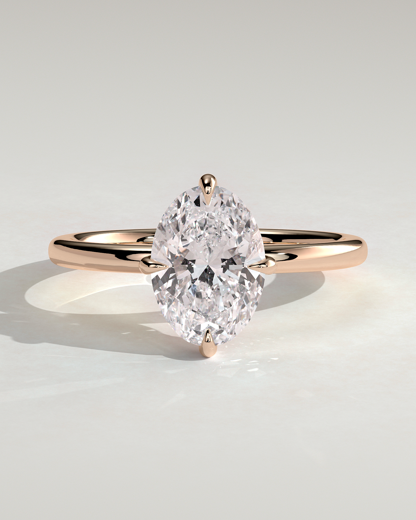 Spencer - Oval 4 Claw Solitaire with Hidden Halo and Compass Rotation  Engagement Ring - 18k Rose Gold High Setting