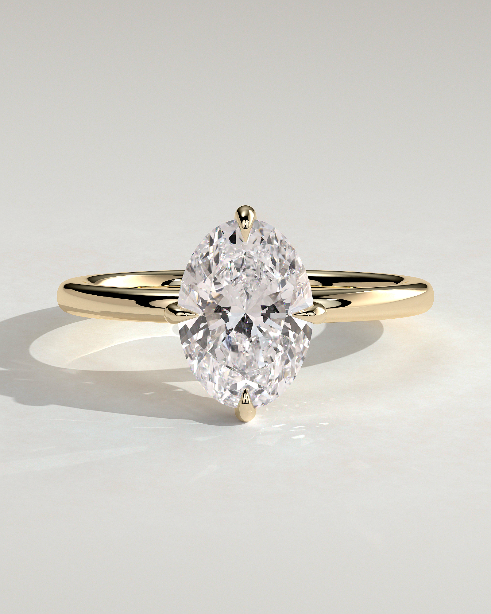Spencer - Oval 4 Claw Solitaire with Hidden Halo and Compass Rotation  Engagement Ring - 18k Yellow Gold High Setting