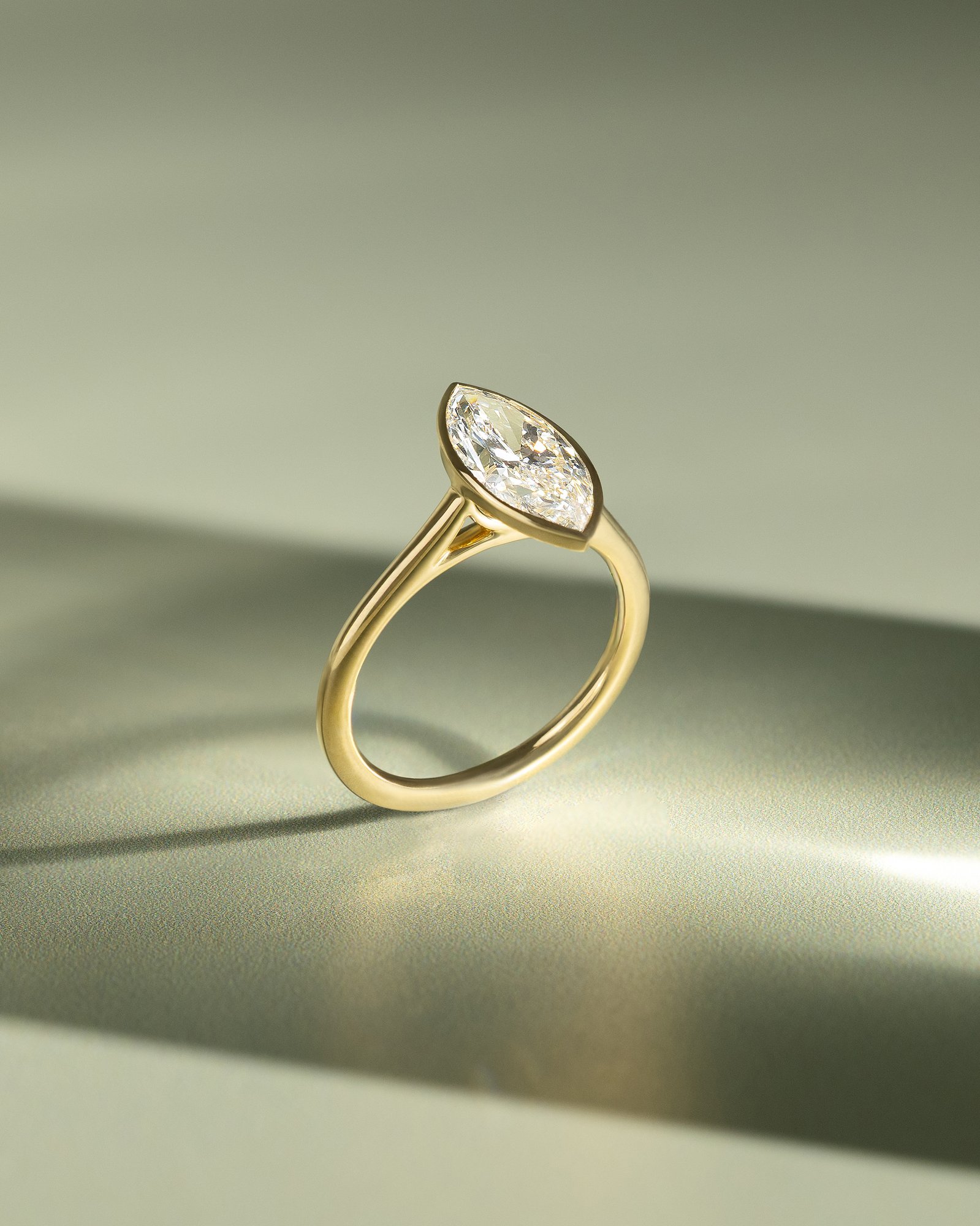 Stella - Marquise Solitaire with Cathedral Bezel Setting Lifestyle Image