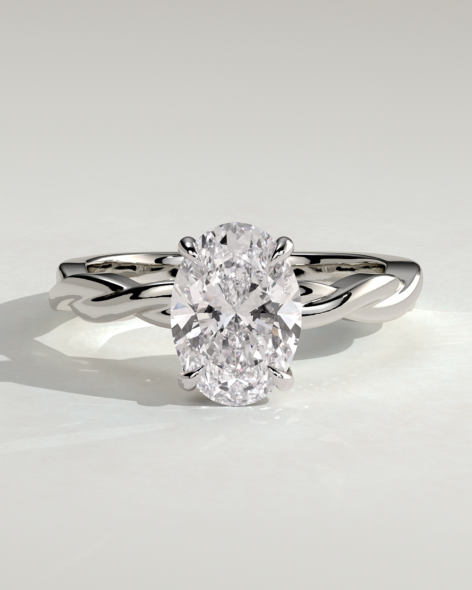 Trinity - Oval 4 Claw Solitaire with Twisted Band Engagement Ring - 18k White Gold